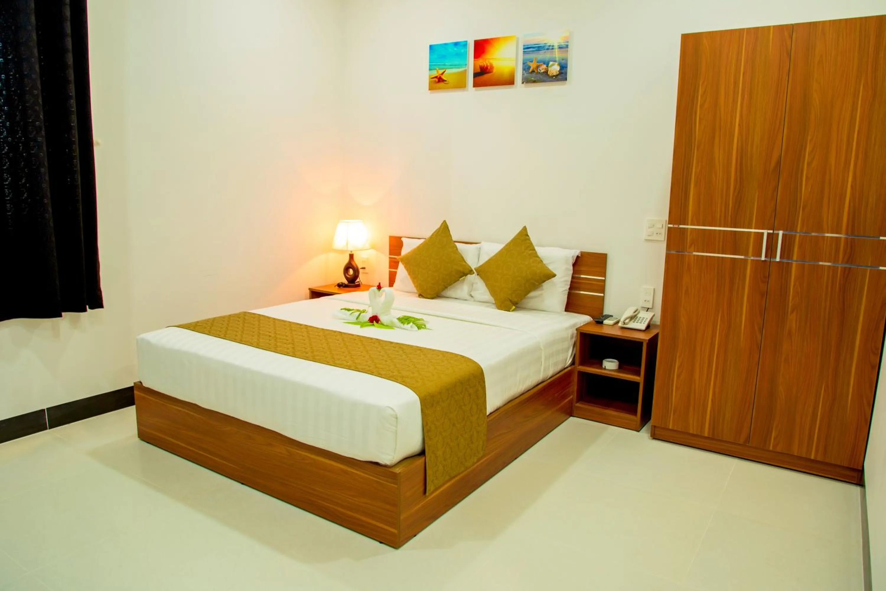 Bed in PHAM GIA HOTEL Mui Ne