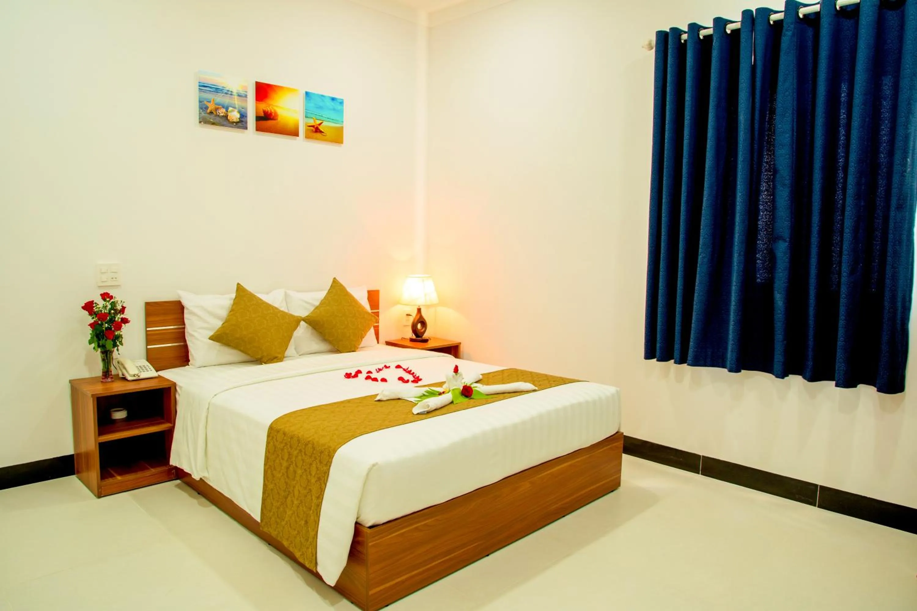 Bed in PHAM GIA HOTEL Mui Ne