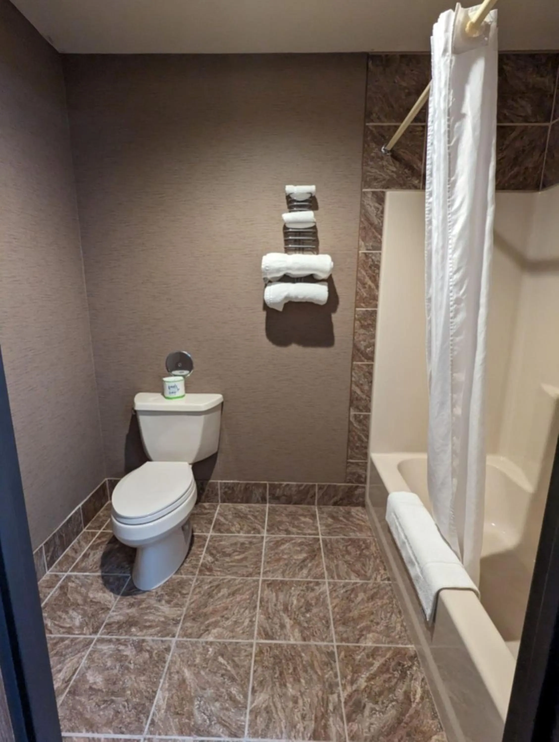 Bathroom in Woodfield Inn and Suites