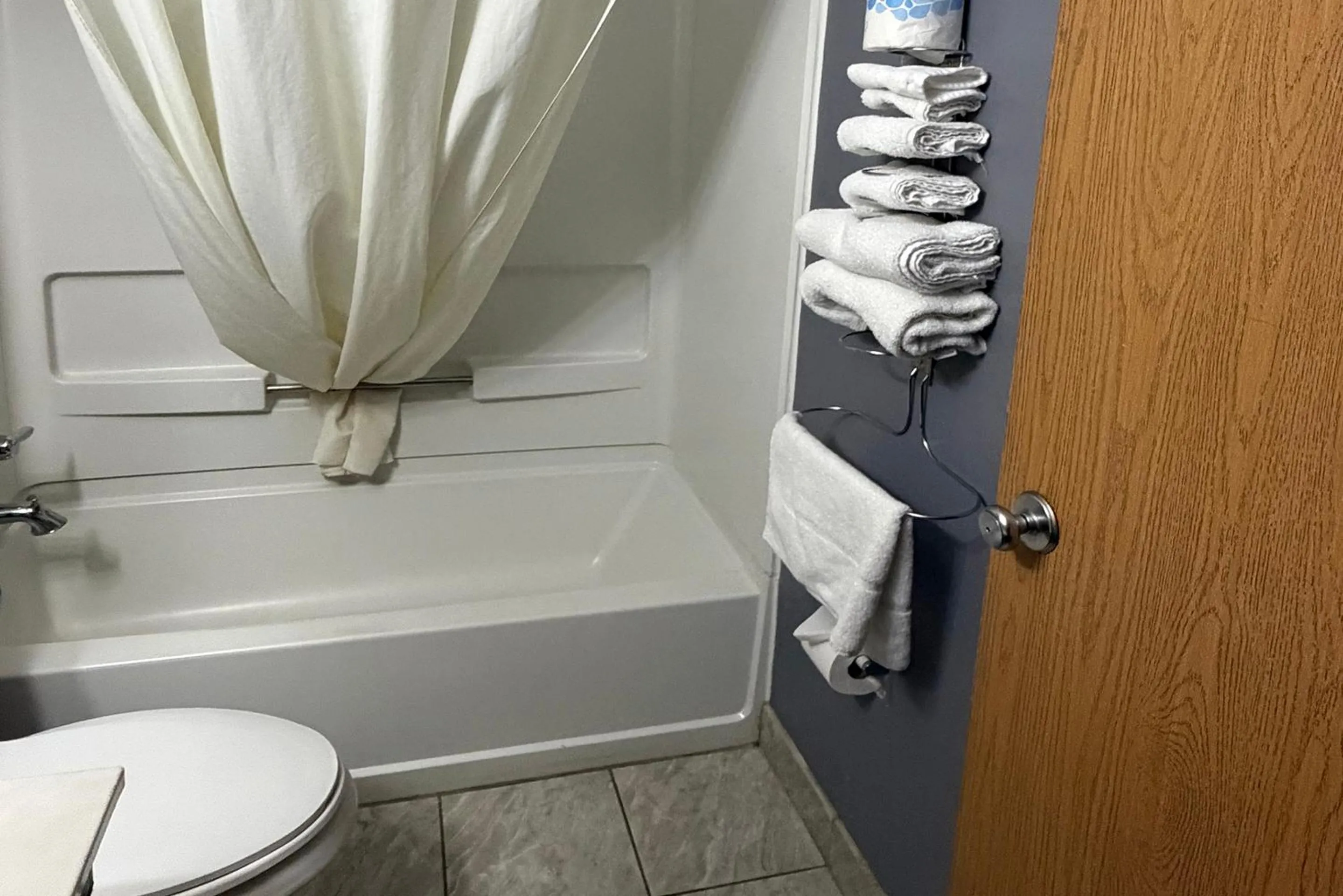 Bathroom, Bed in Coratel Inn and Suites by Jasper Stillwater