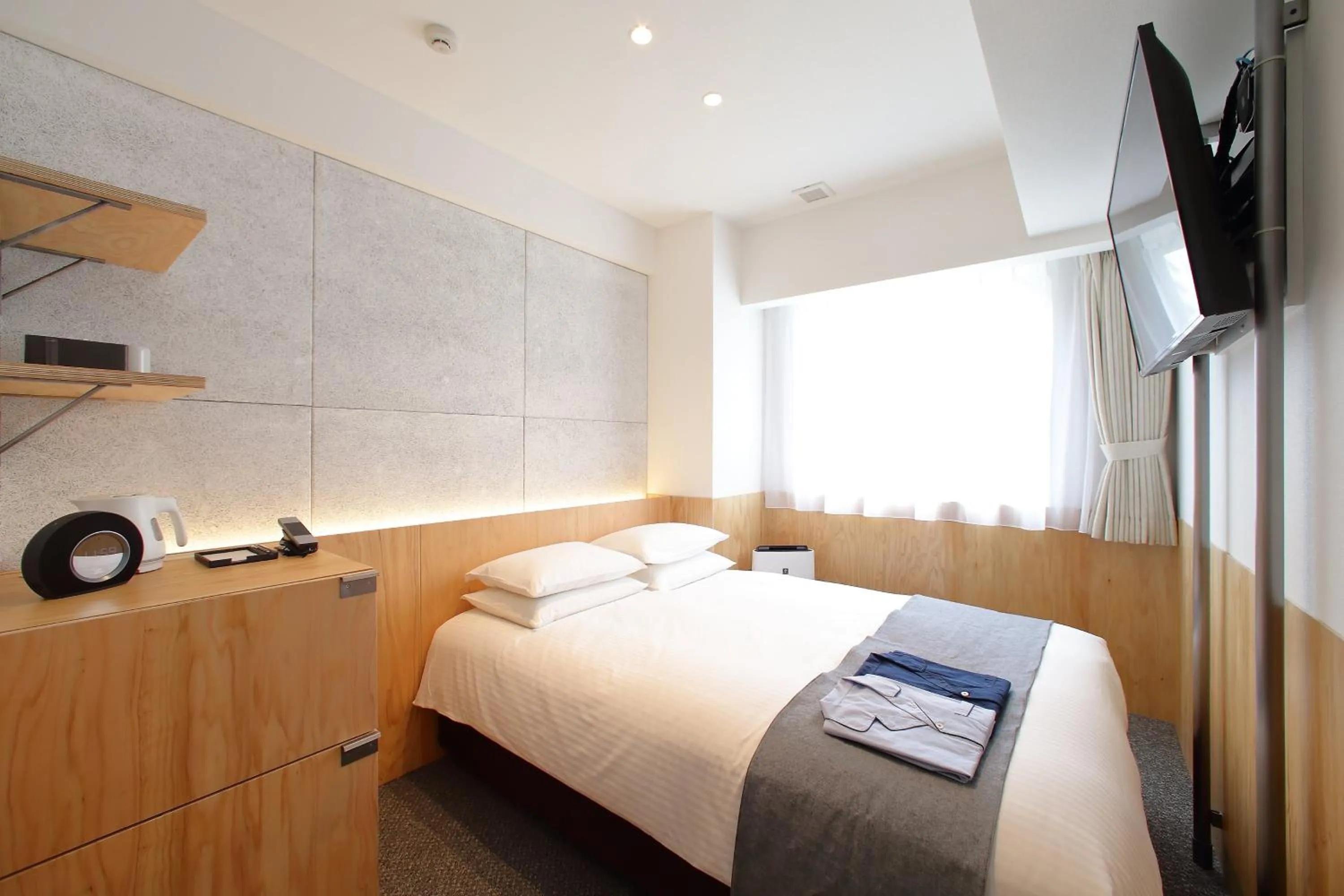 Bed in Hotel Oriental Express Tokyo Kamata