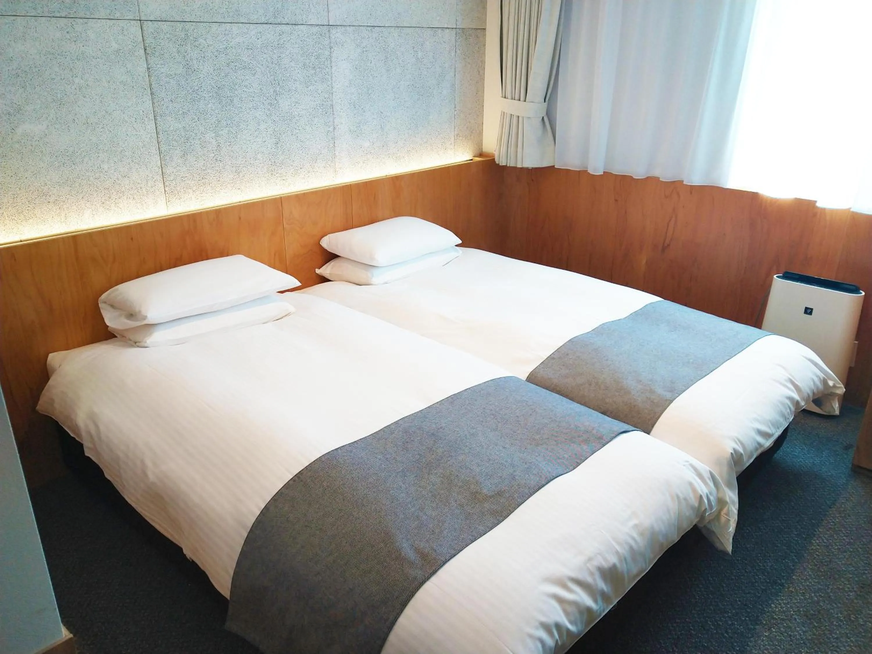 Bed in Hotel Oriental Express Tokyo Kamata
