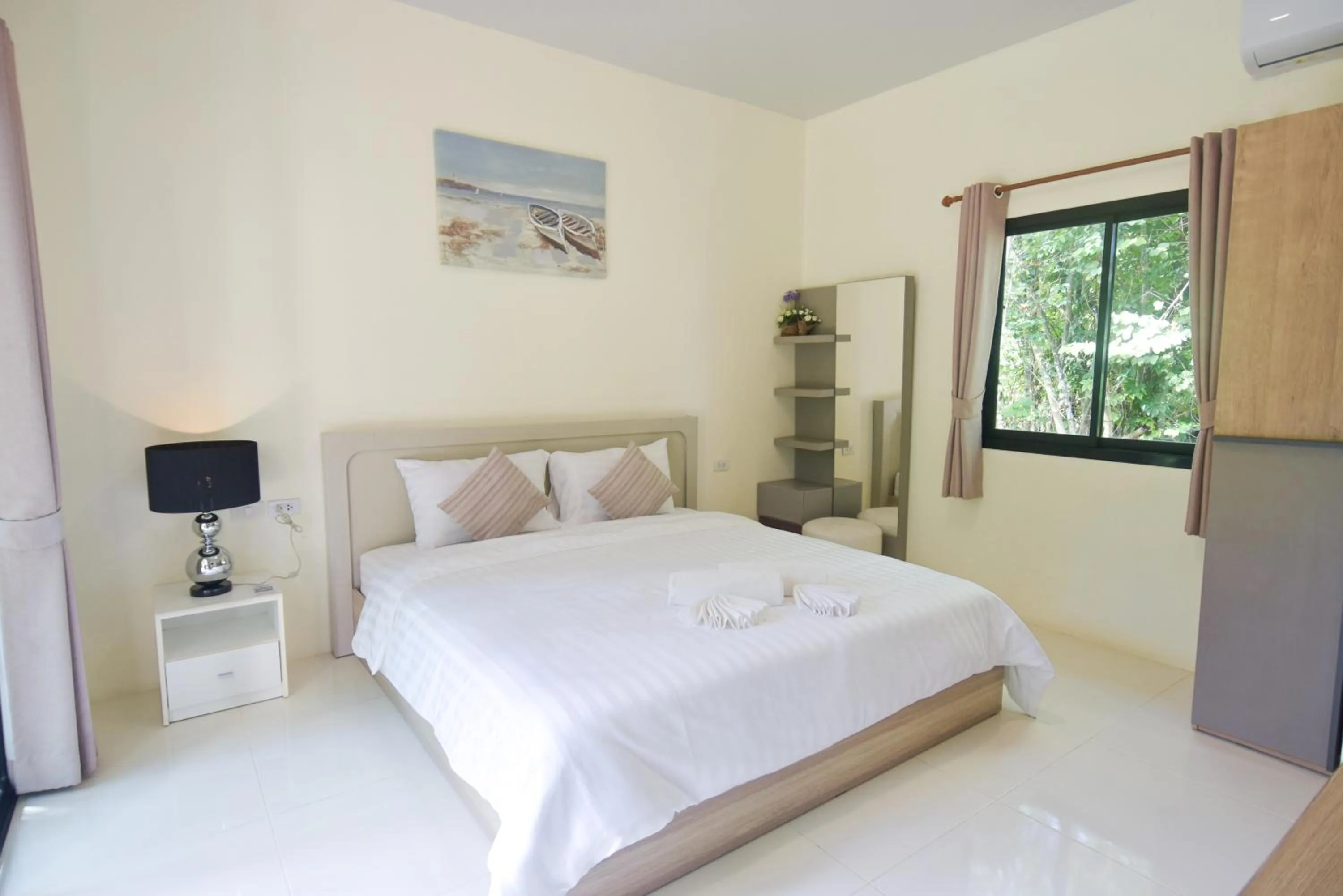 Bed in Garden Villa Khaolak