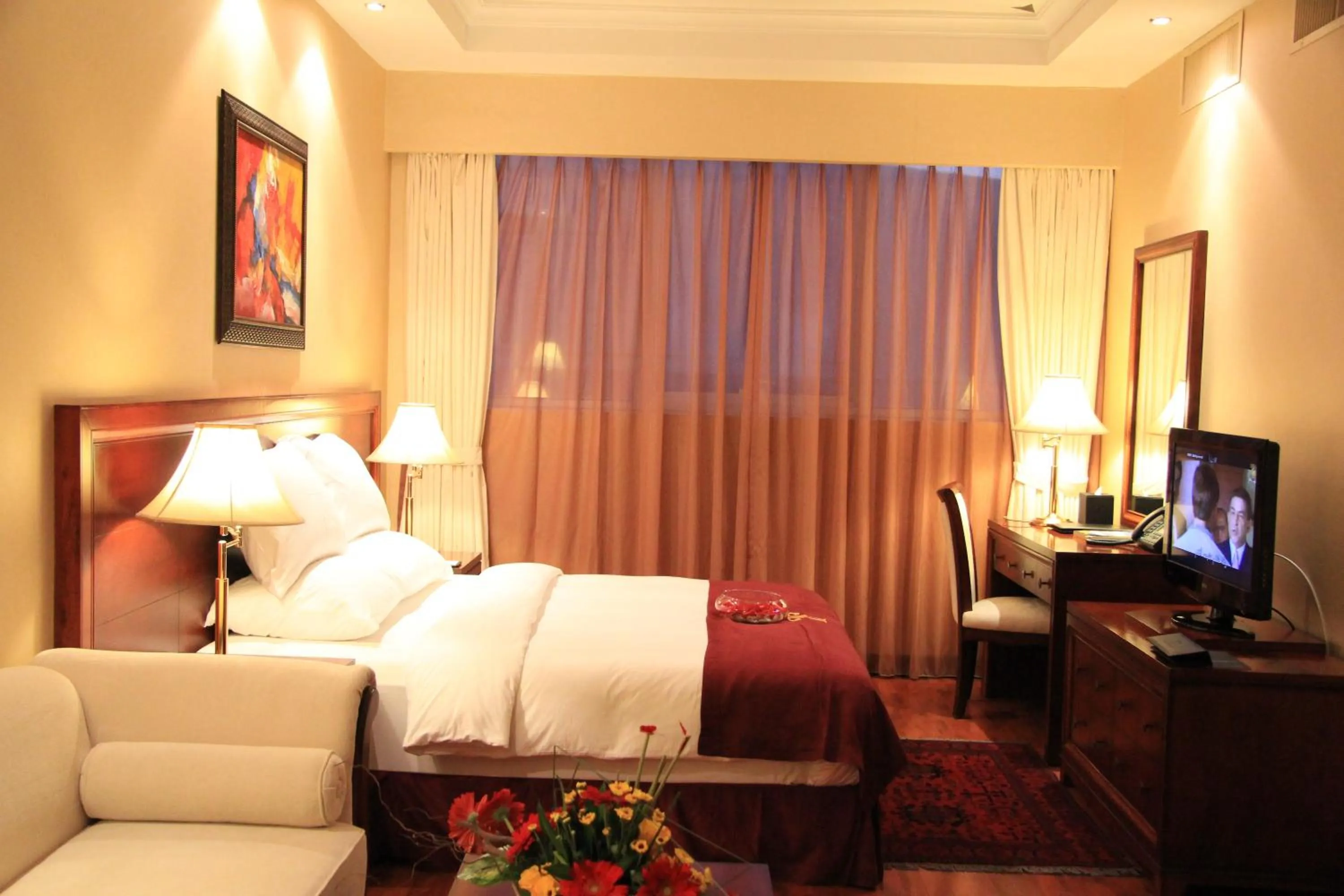 Bed in TRIANON ROYAL HOTEL