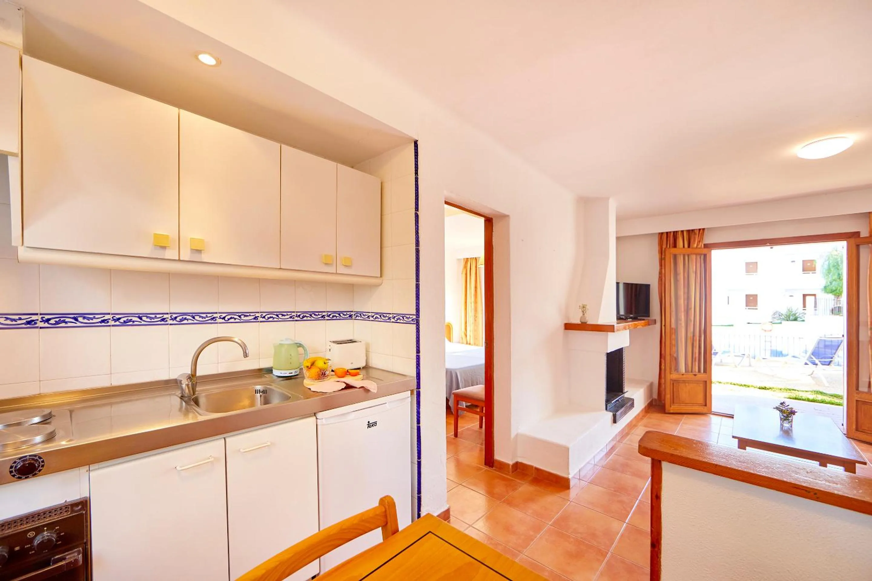 Kitchen or kitchenette in Gavimar Cala Gran Hotel and Apartments