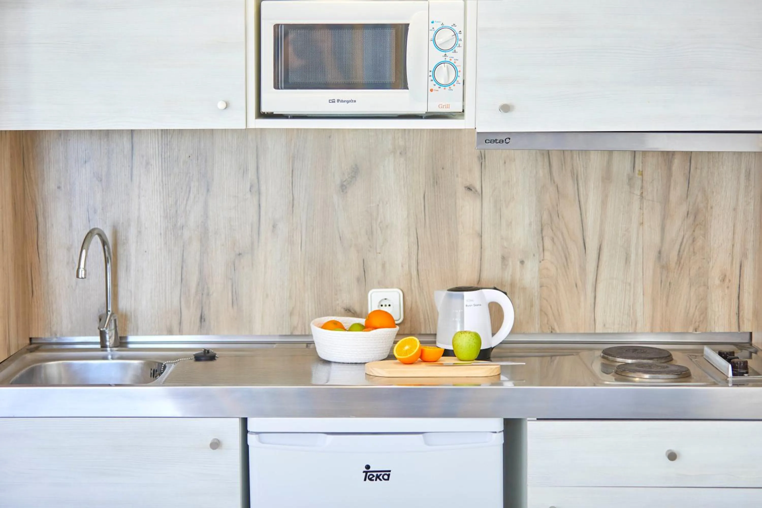 Kitchen or kitchenette in Gavimar Ariel Chico Hotel and Apartments