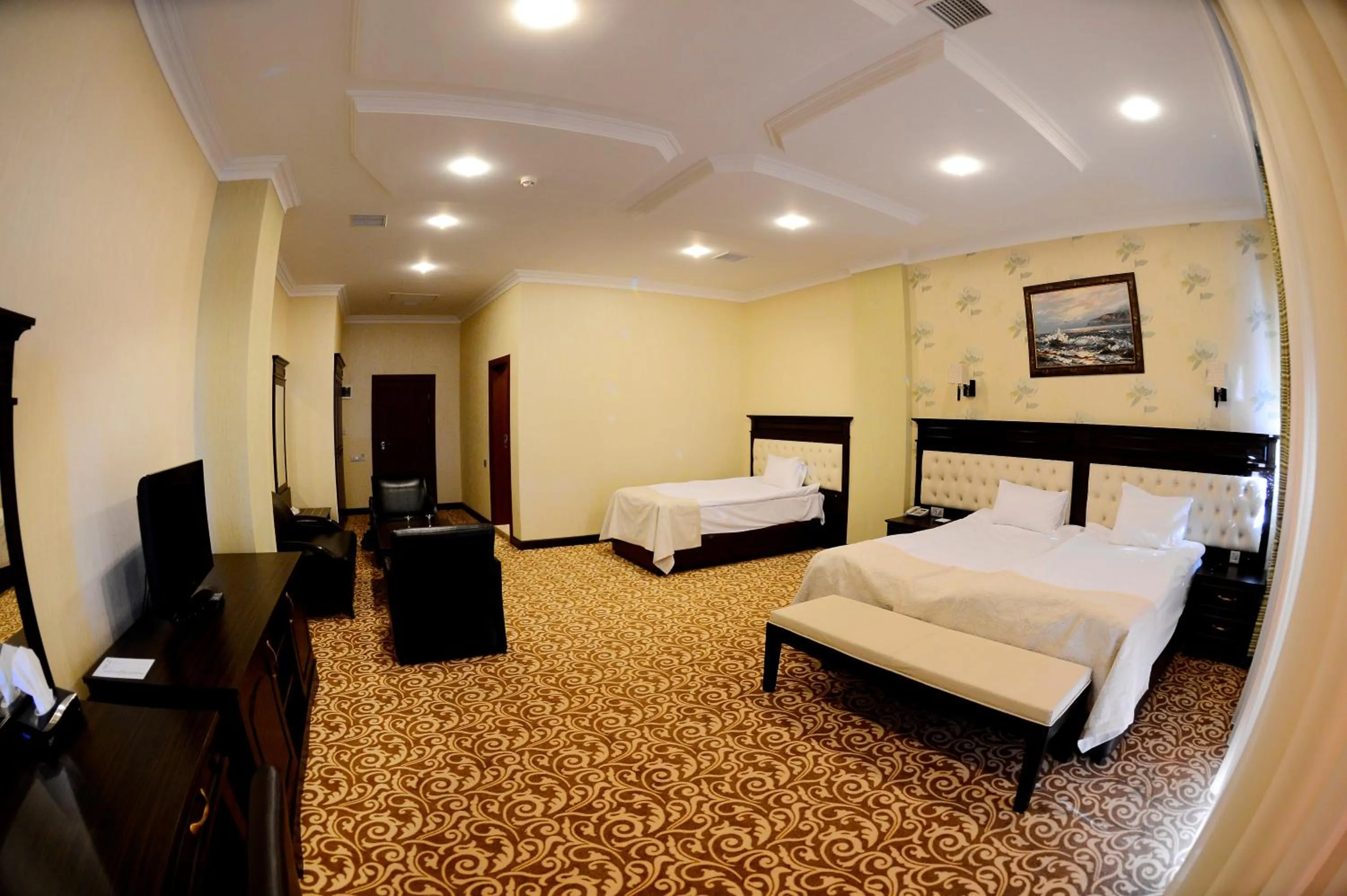 Bed in New Baku Hotel