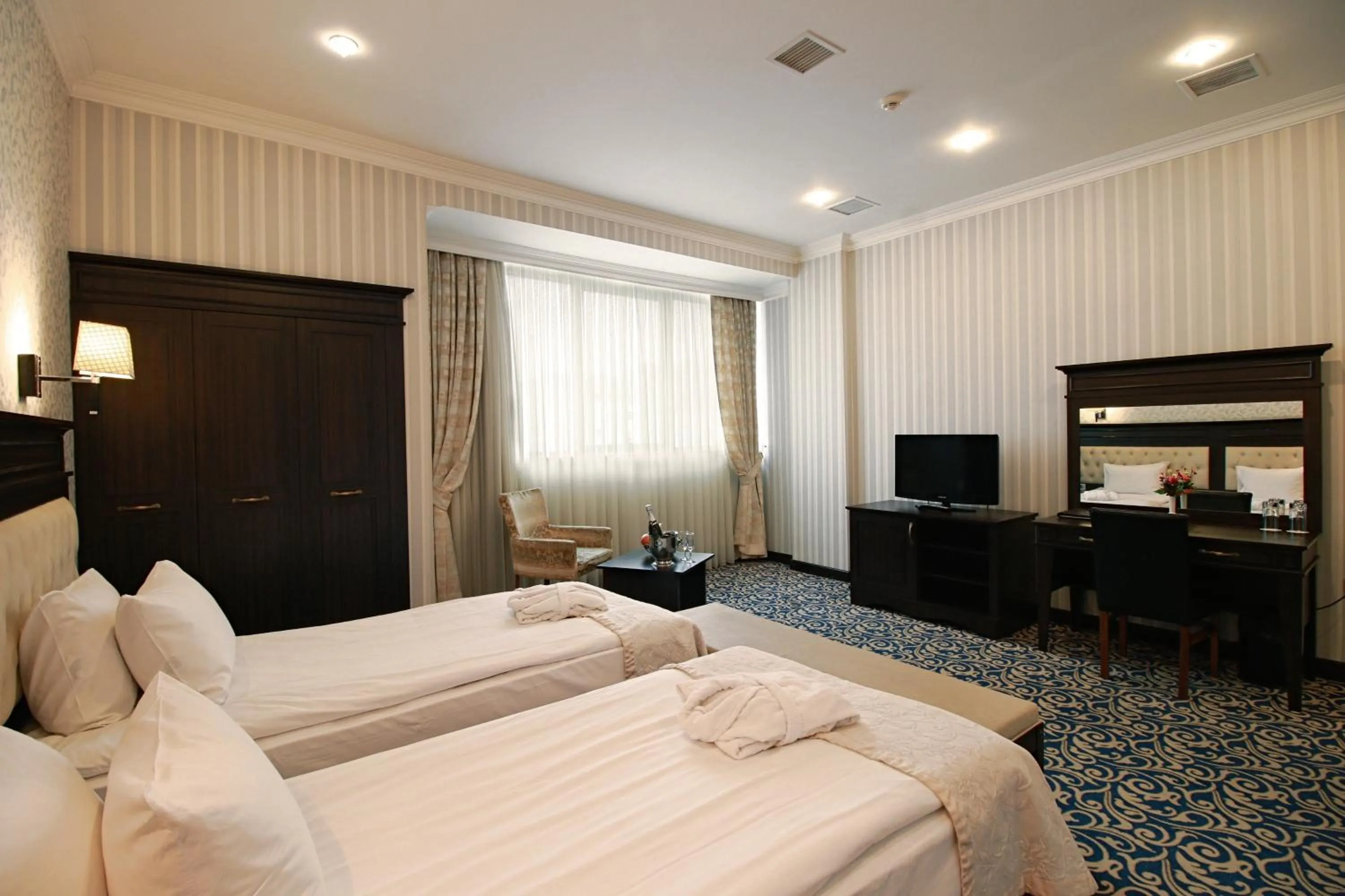 Photo of the whole room in New Baku Hotel