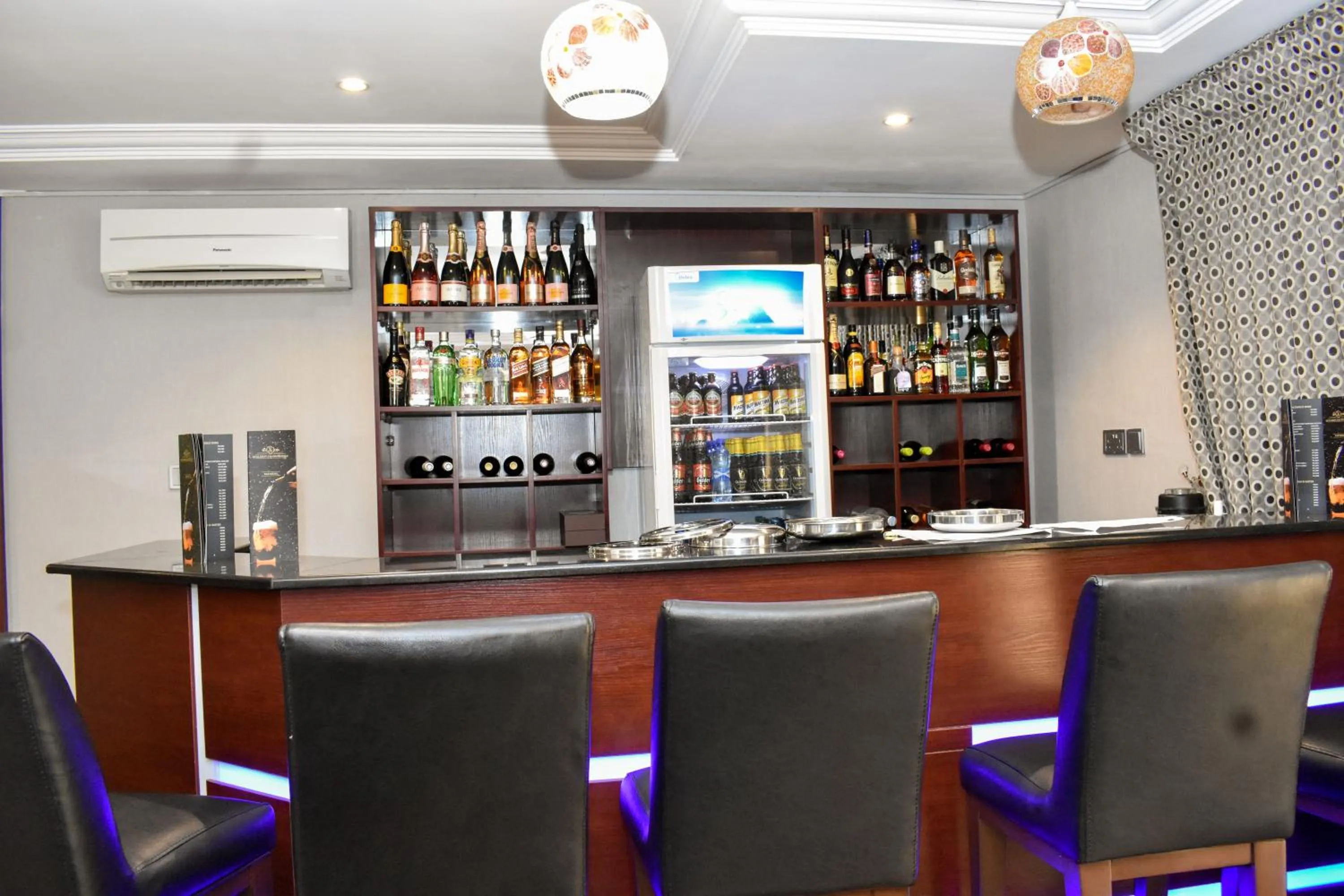 Communal lounge/ TV room in Qualibest Grand Hotels