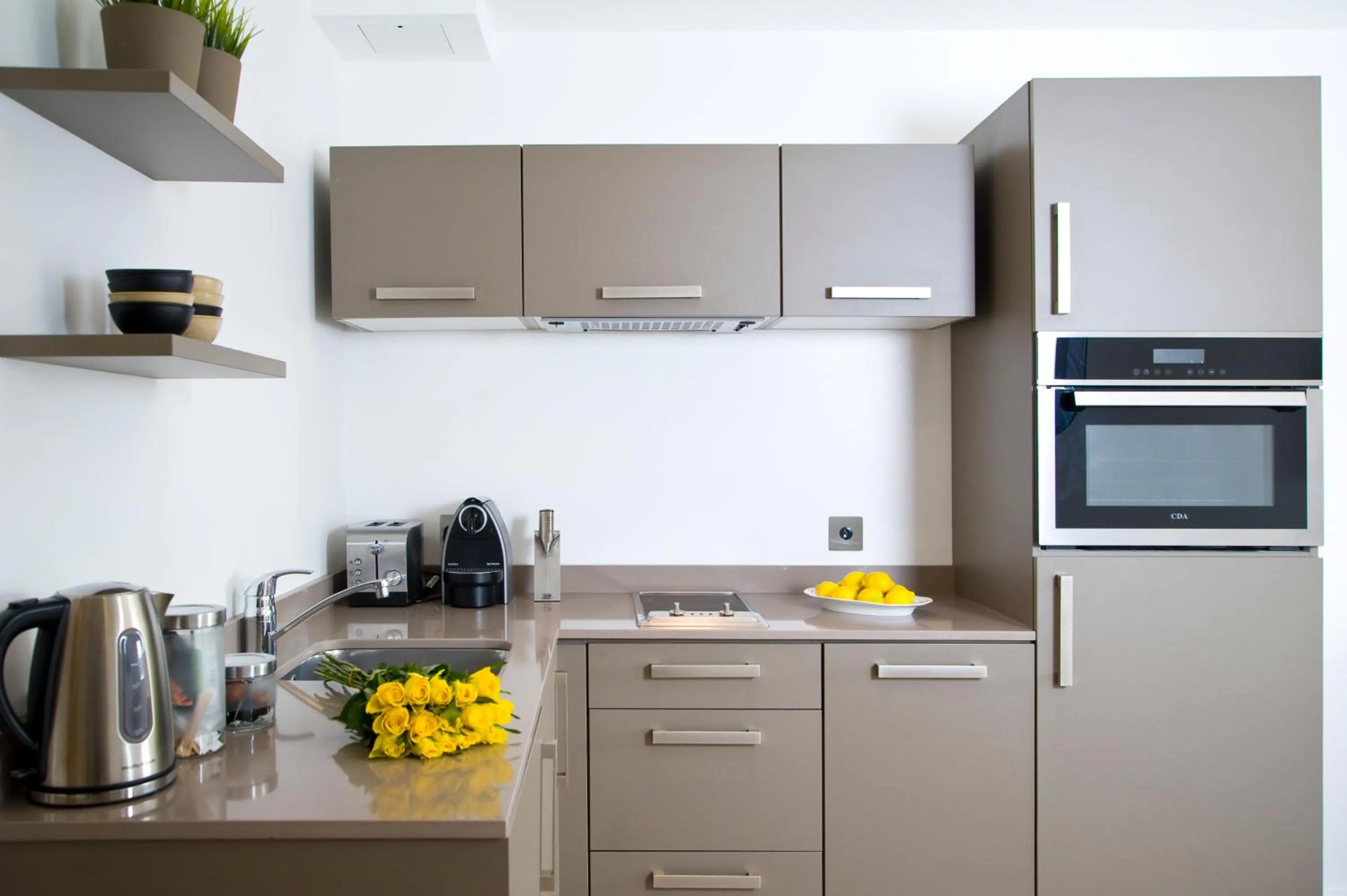Kitchen or kitchenette in The Rosebery by Supercity Aparthotels