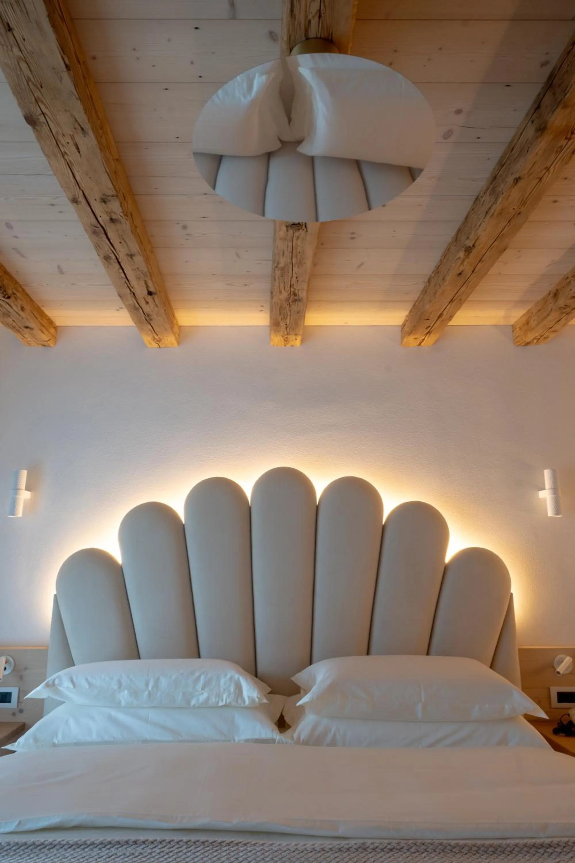 Bed in Belvedere Dolomites Flower Hotel