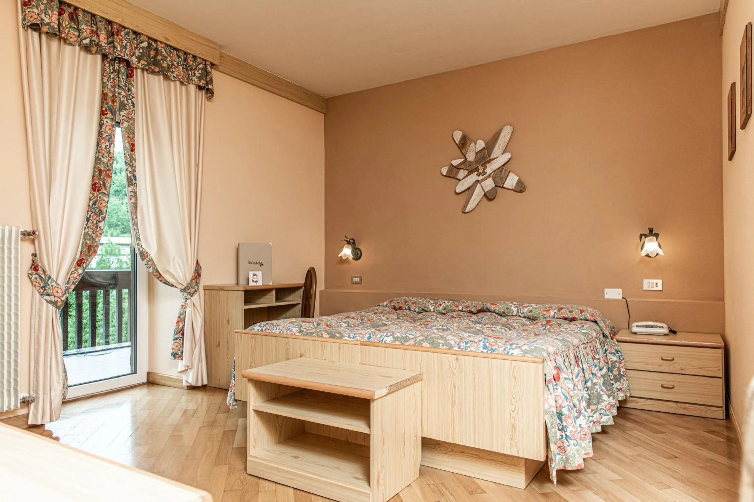 Bedroom, Bed in Belvedere Dolomites Flower Hotel