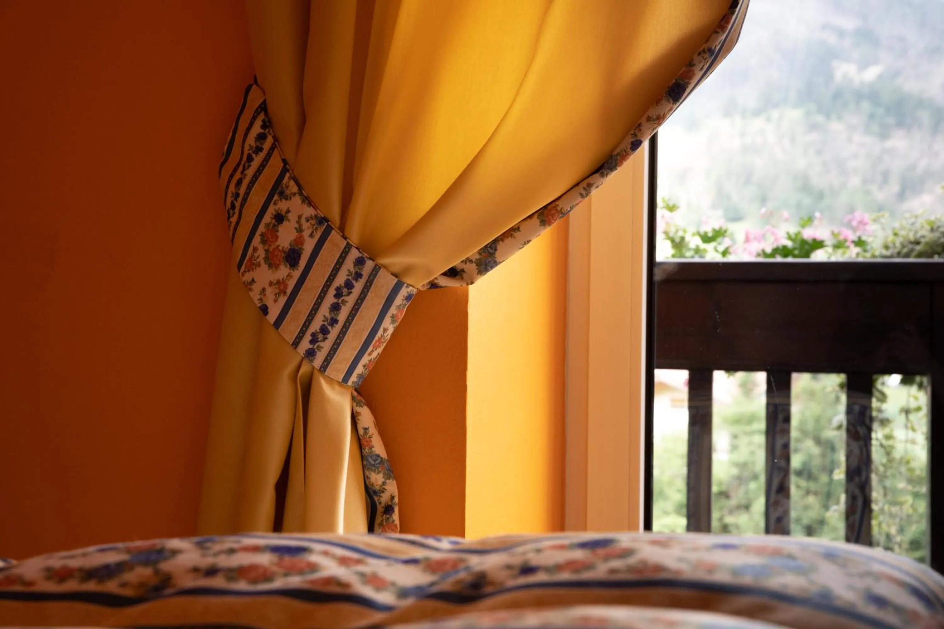 Bed in Belvedere Dolomites Flower Hotel