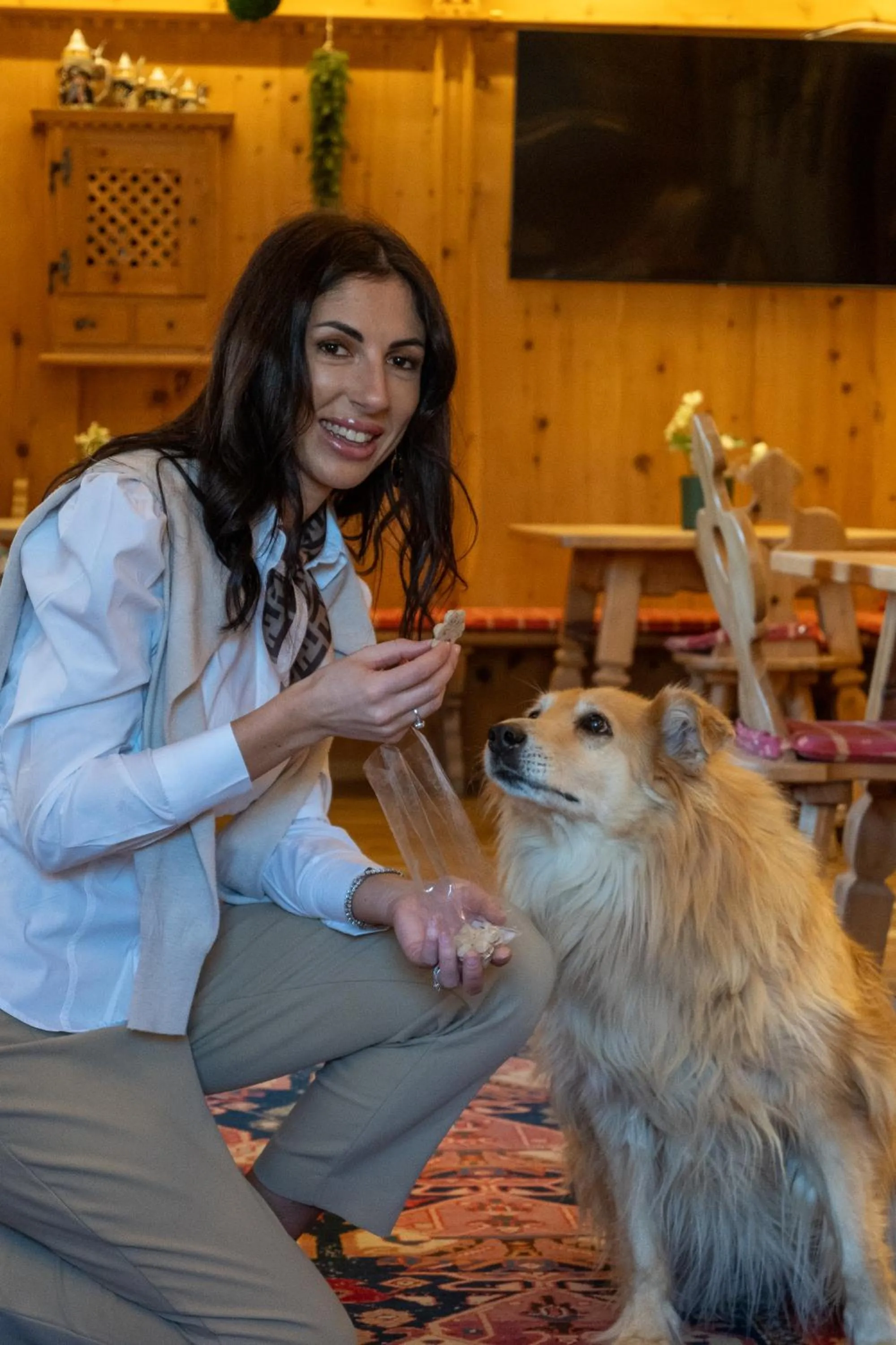 Communal lounge/ TV room in Belvedere Dolomites Flower Hotel