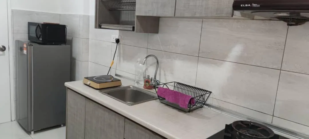 Kitchen or kitchenette in The Robertson Bukit Bintang by Wowhome