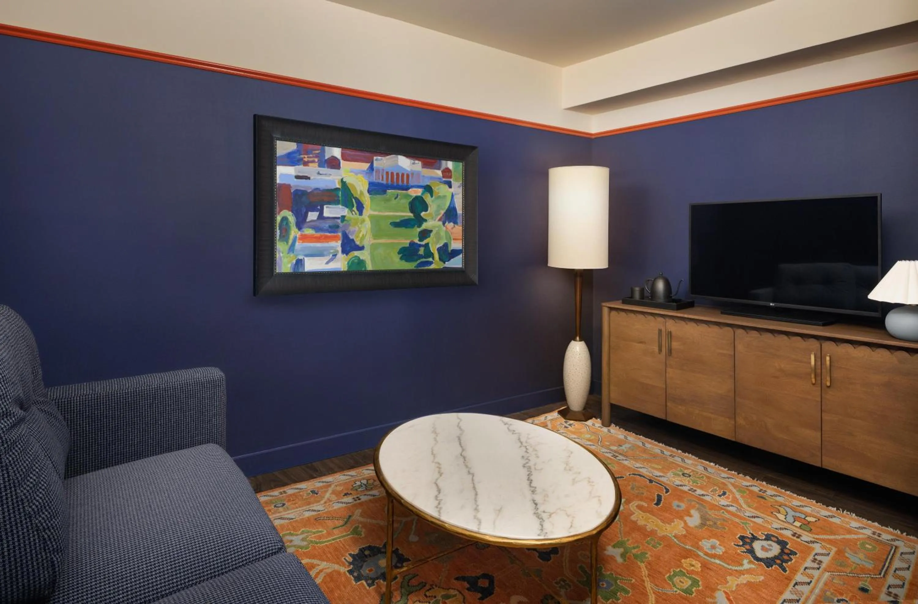 Living room in Graduate by Hilton Charlottesville