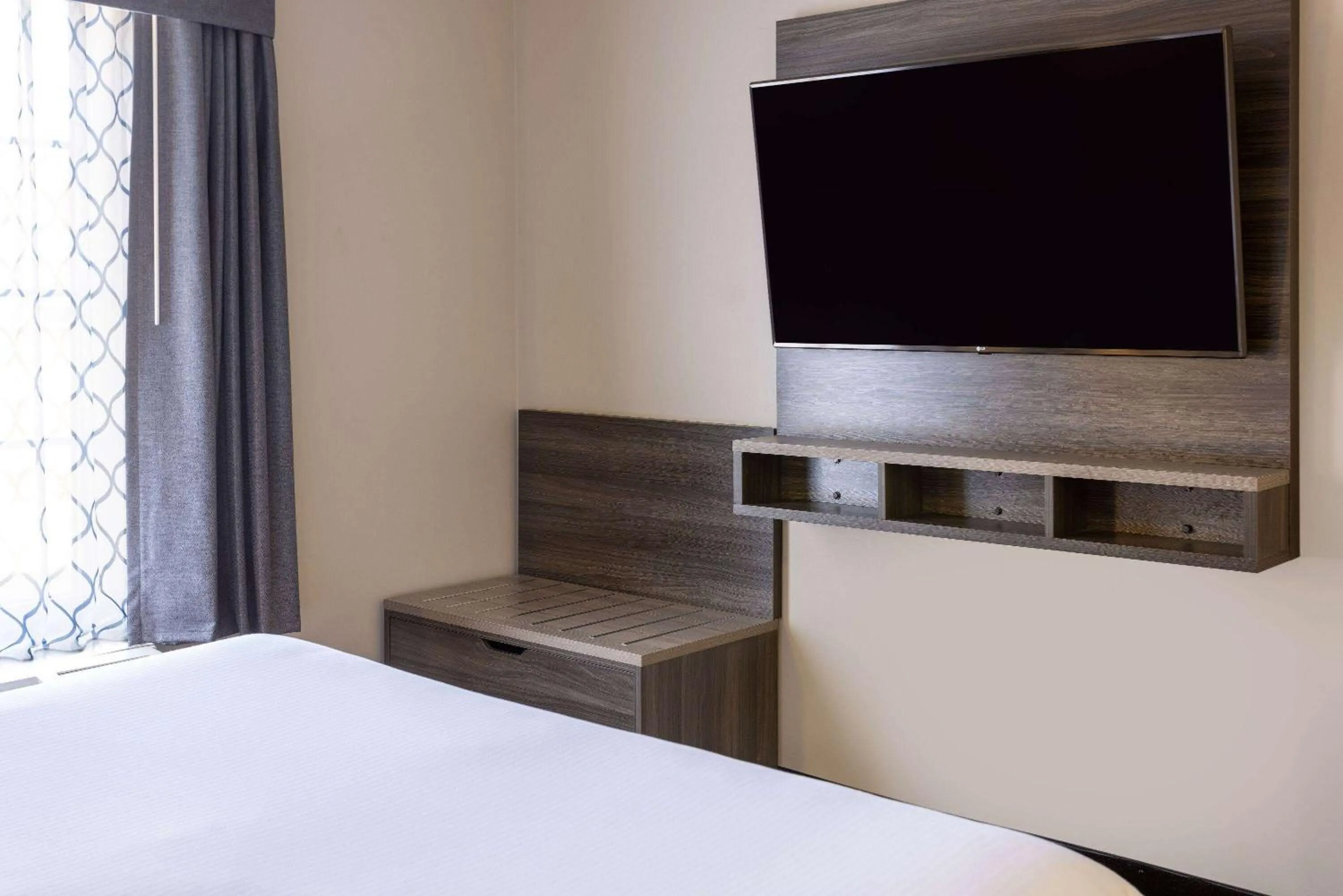 Bed in Baymont by Wyndham Budd Lake