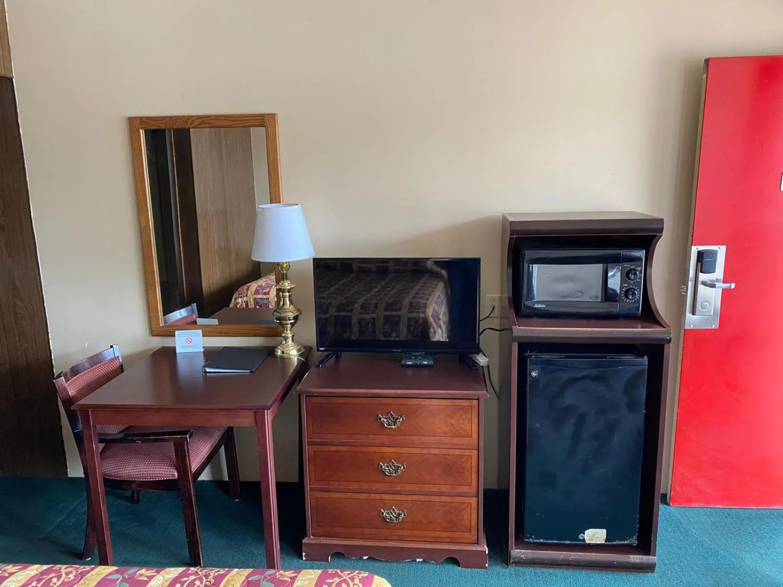 Bedroom in Budget Host Village Inn