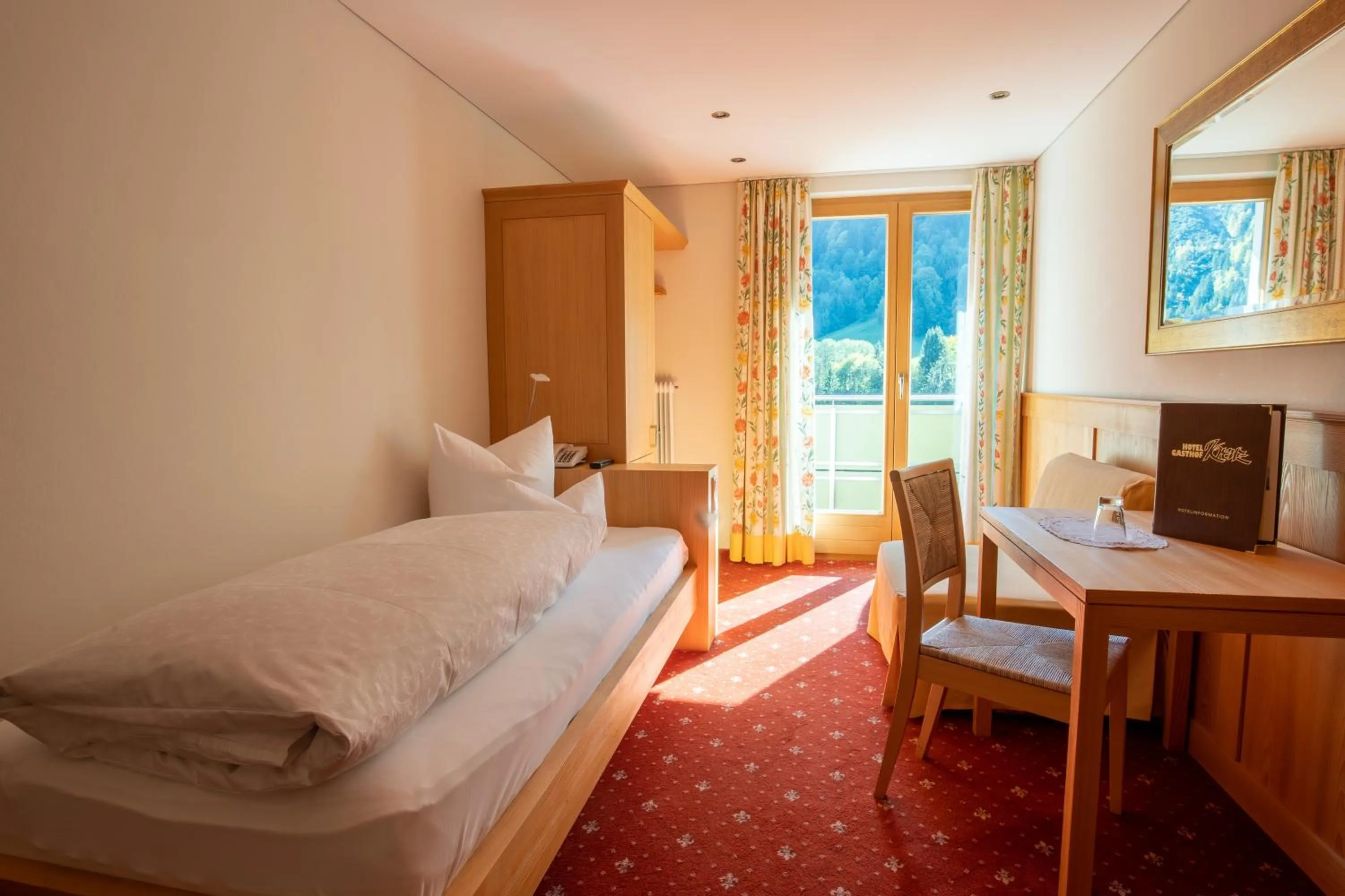 Photo of the whole room, Bed in Hotel Gasthof KREUZ