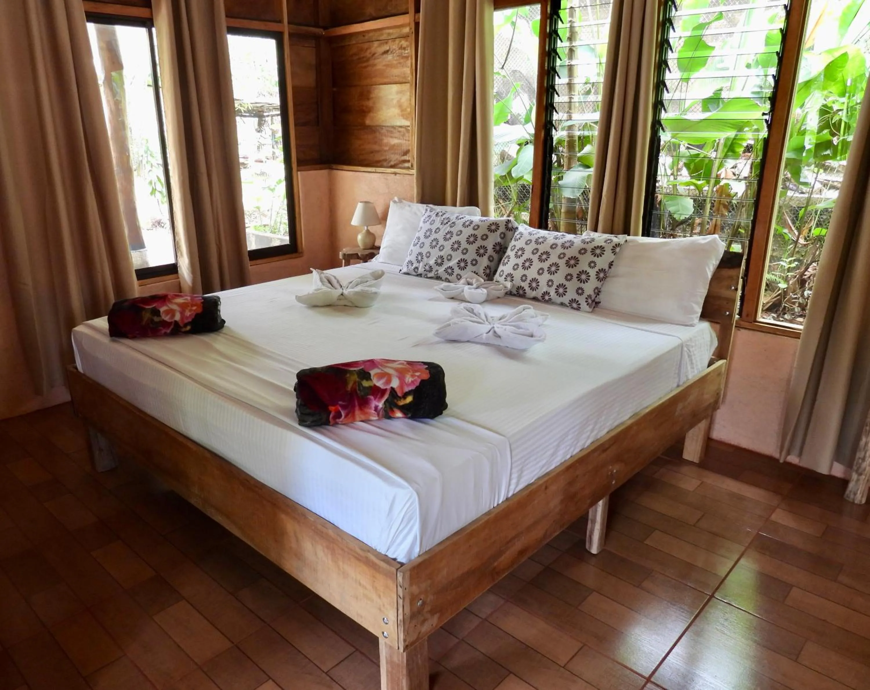 Bed in Iguanitas Lodge