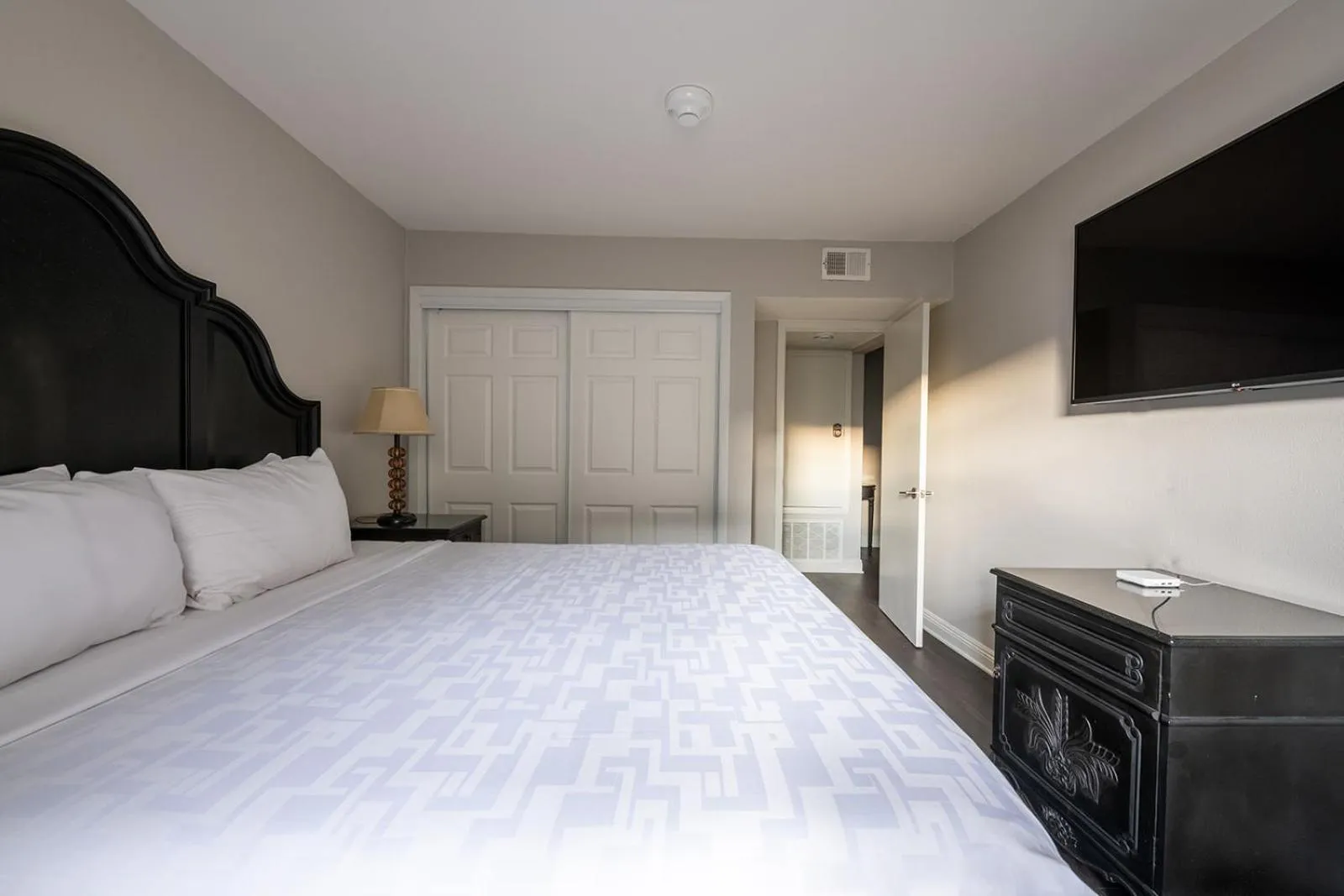 Bed in French Quarter Suites Hotel