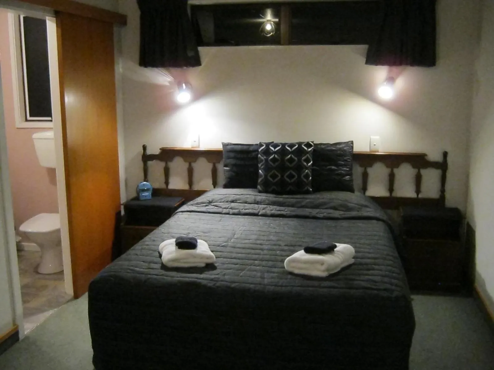 Bed in Blue Dolphin Motel