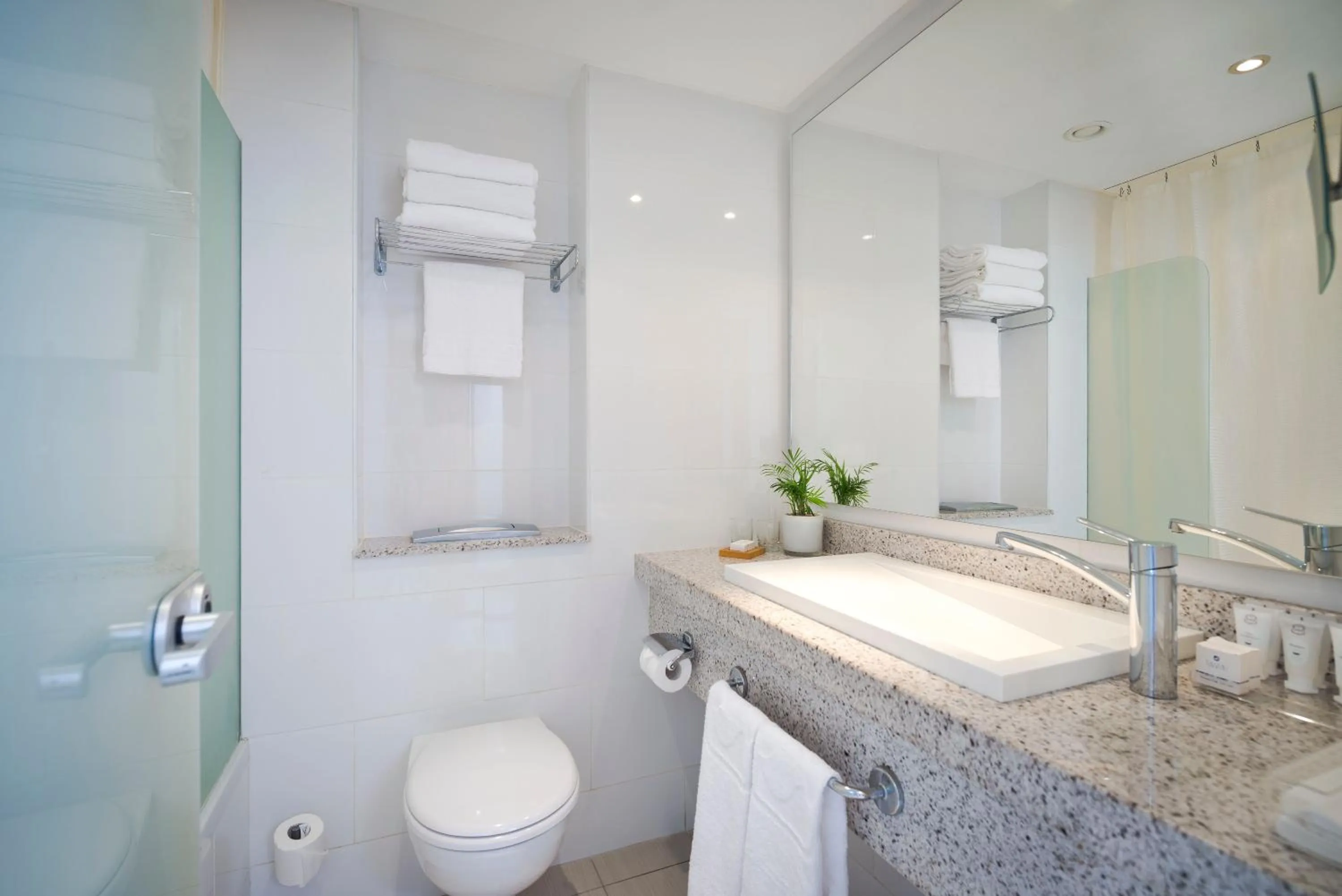 Bathroom in Agamim by Isrotel Collection