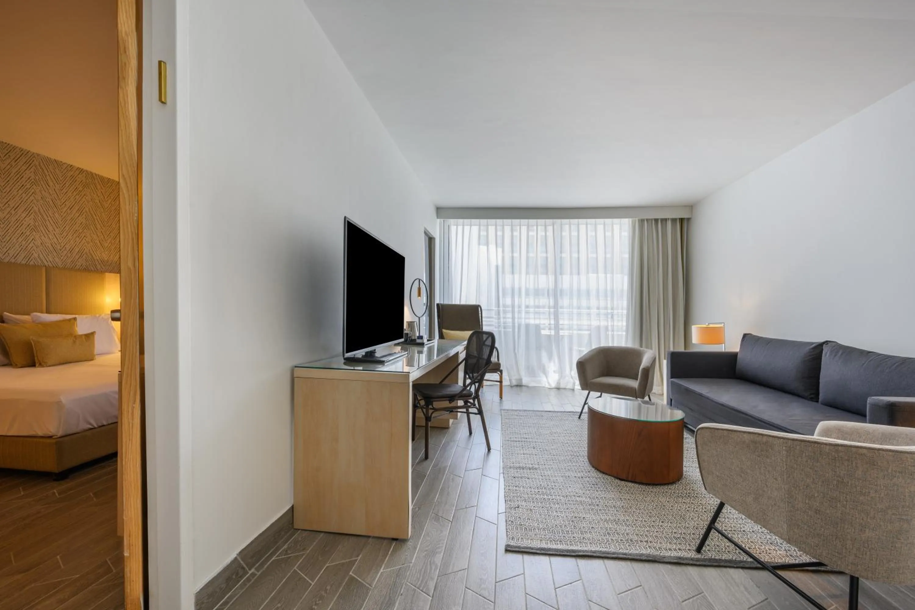 Living room, Bed in Lagoona by Isrotel Collection