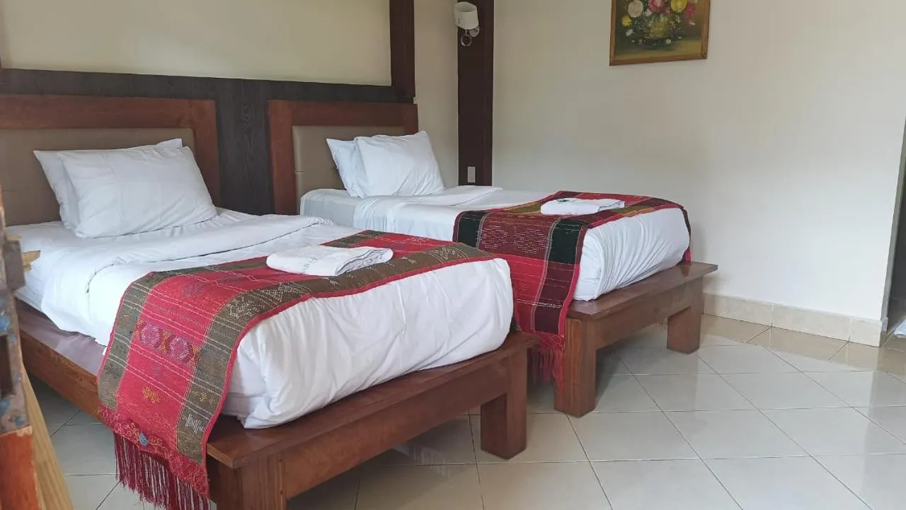Bed in Toba Village Inn