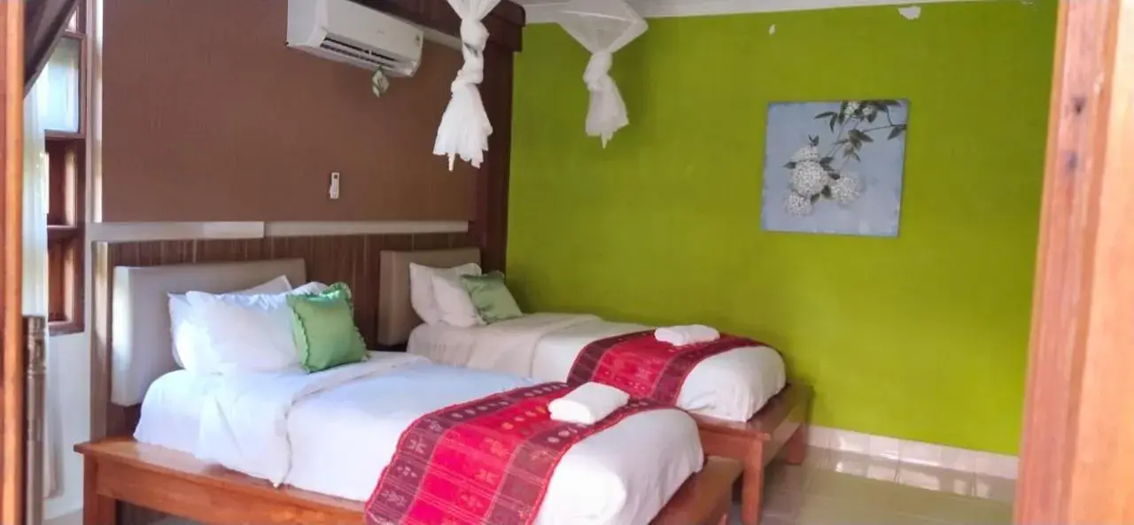 Twin Room with Garden View in Toba Village Inn Twin Room with Garden View in Toba Village Inn