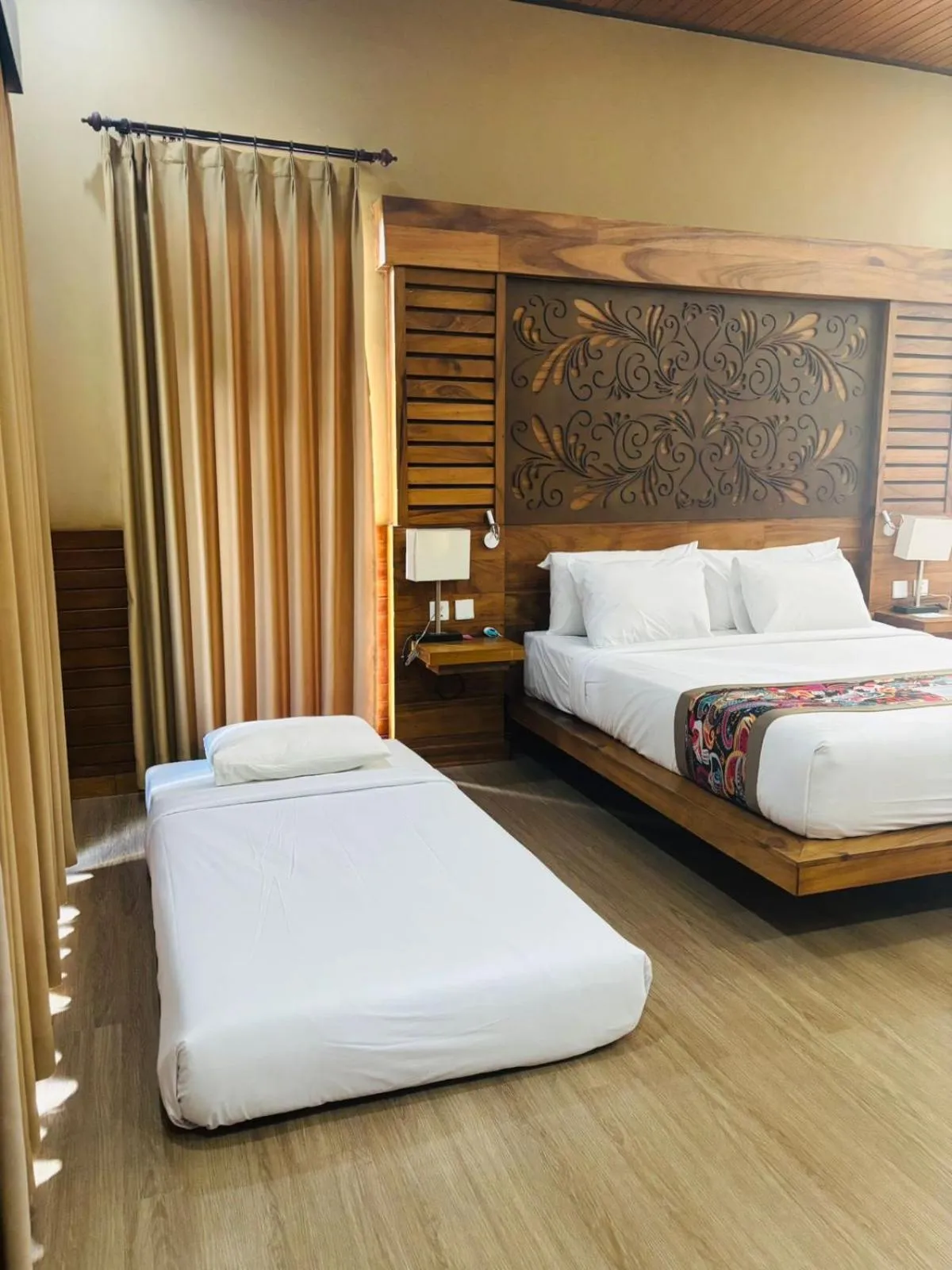 Bed in Adil Villa & Resort
