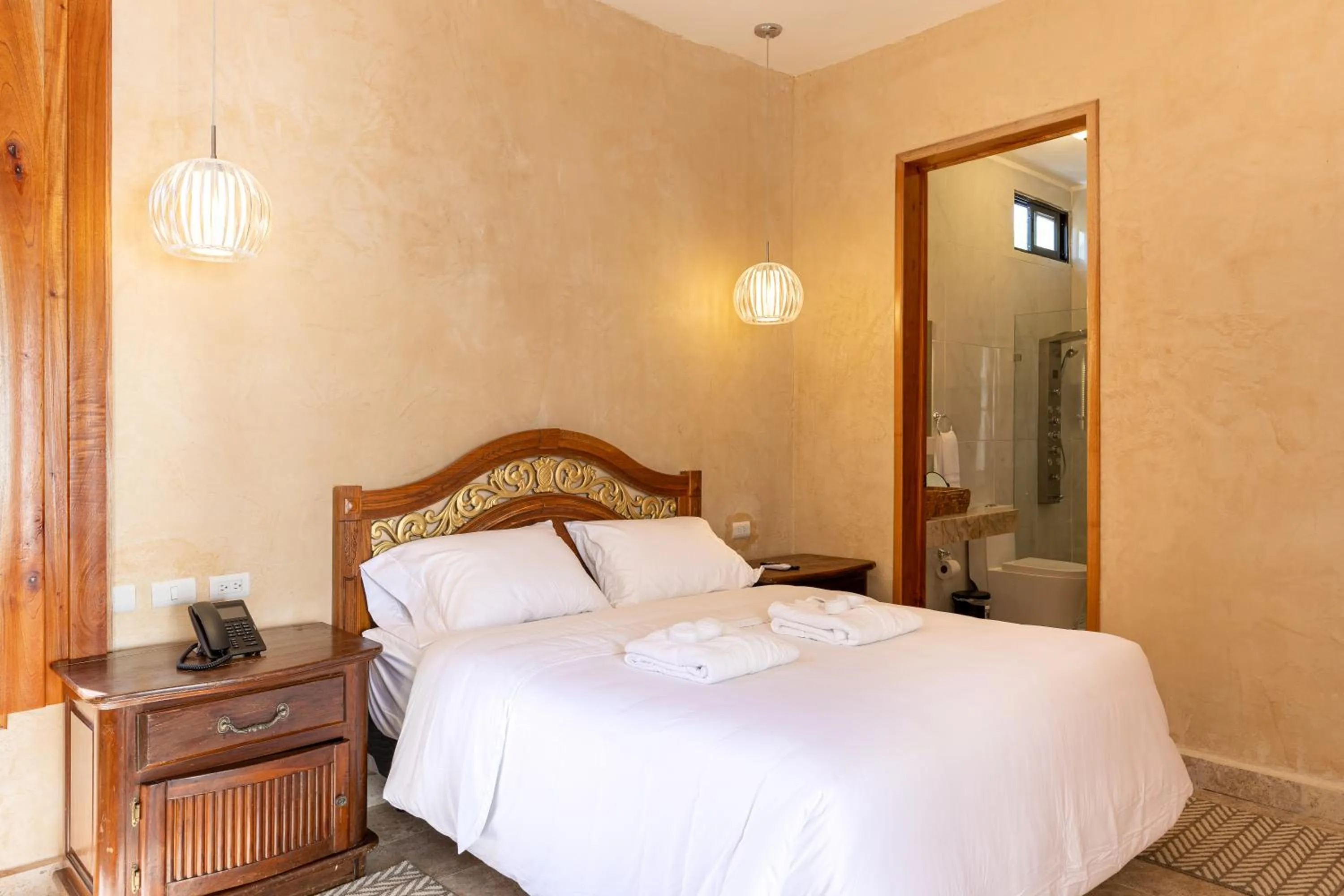 Bed in Hacienda Cenote San Ignacio