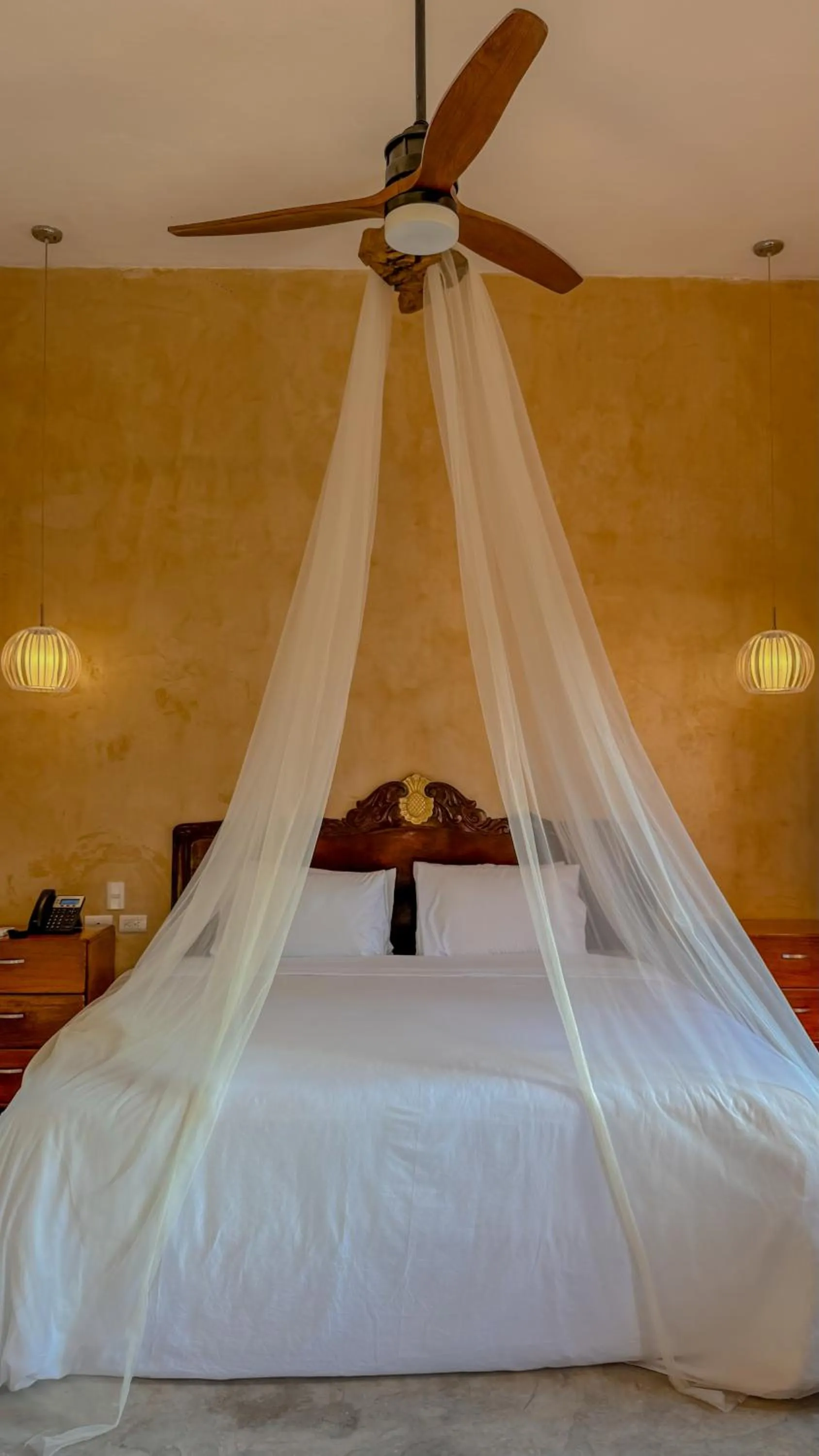 Bed in Hacienda Cenote San Ignacio