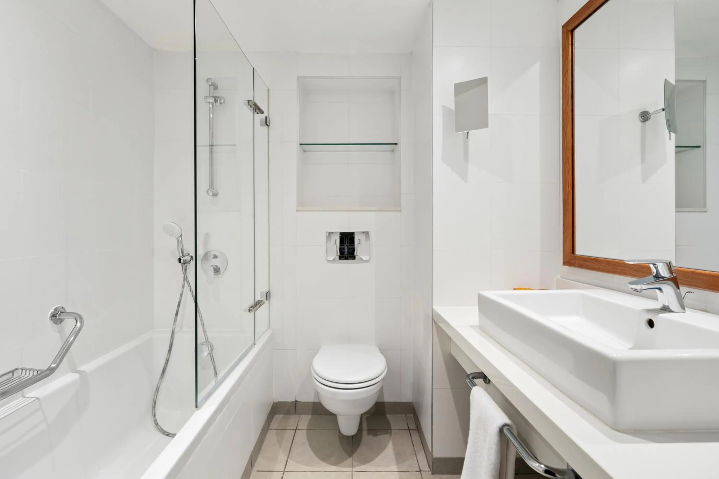 Bathroom in Sport Club by Isrotel Collection