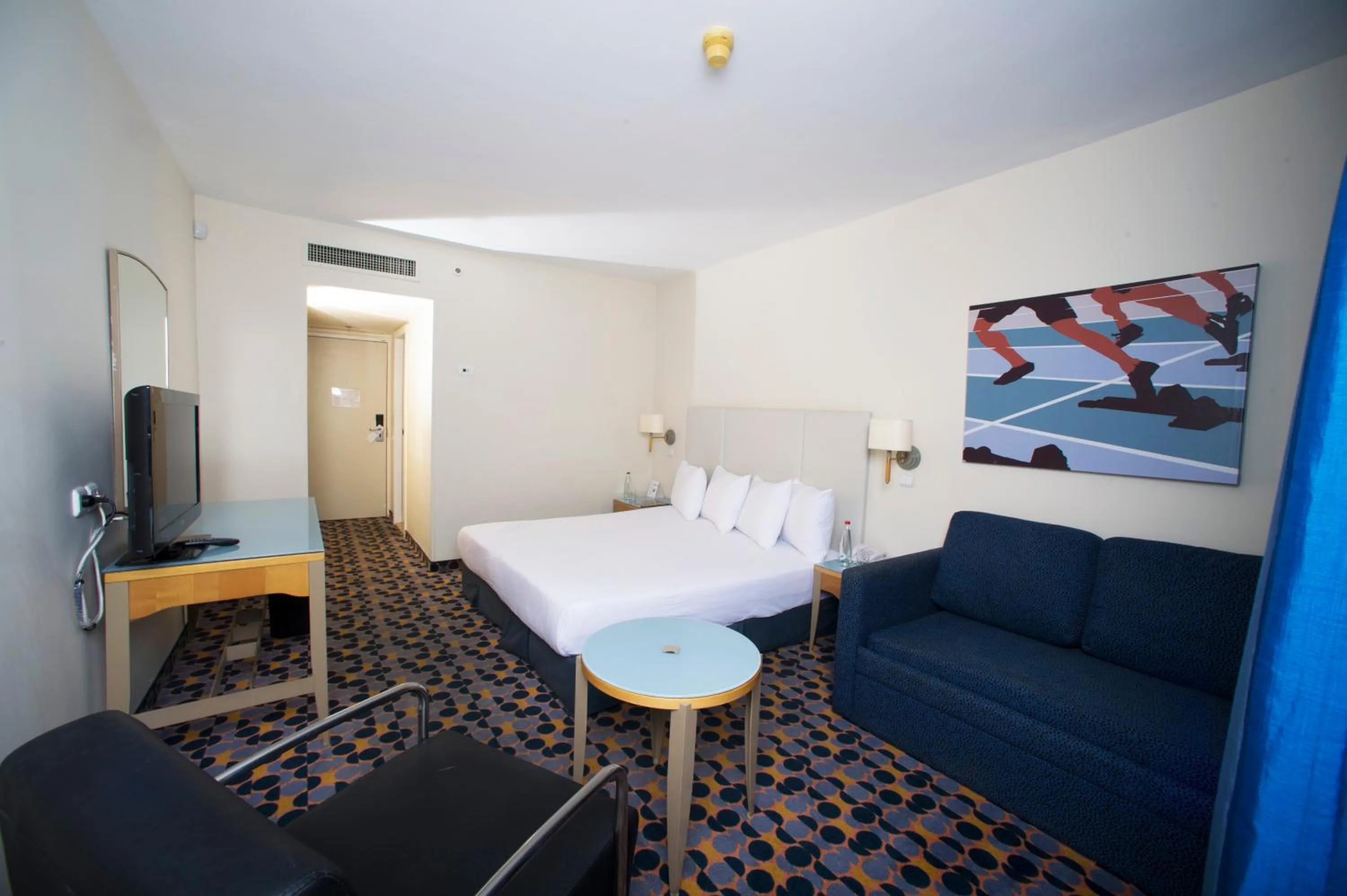 Photo of the whole room, Bed in Sport Club by Isrotel Collection