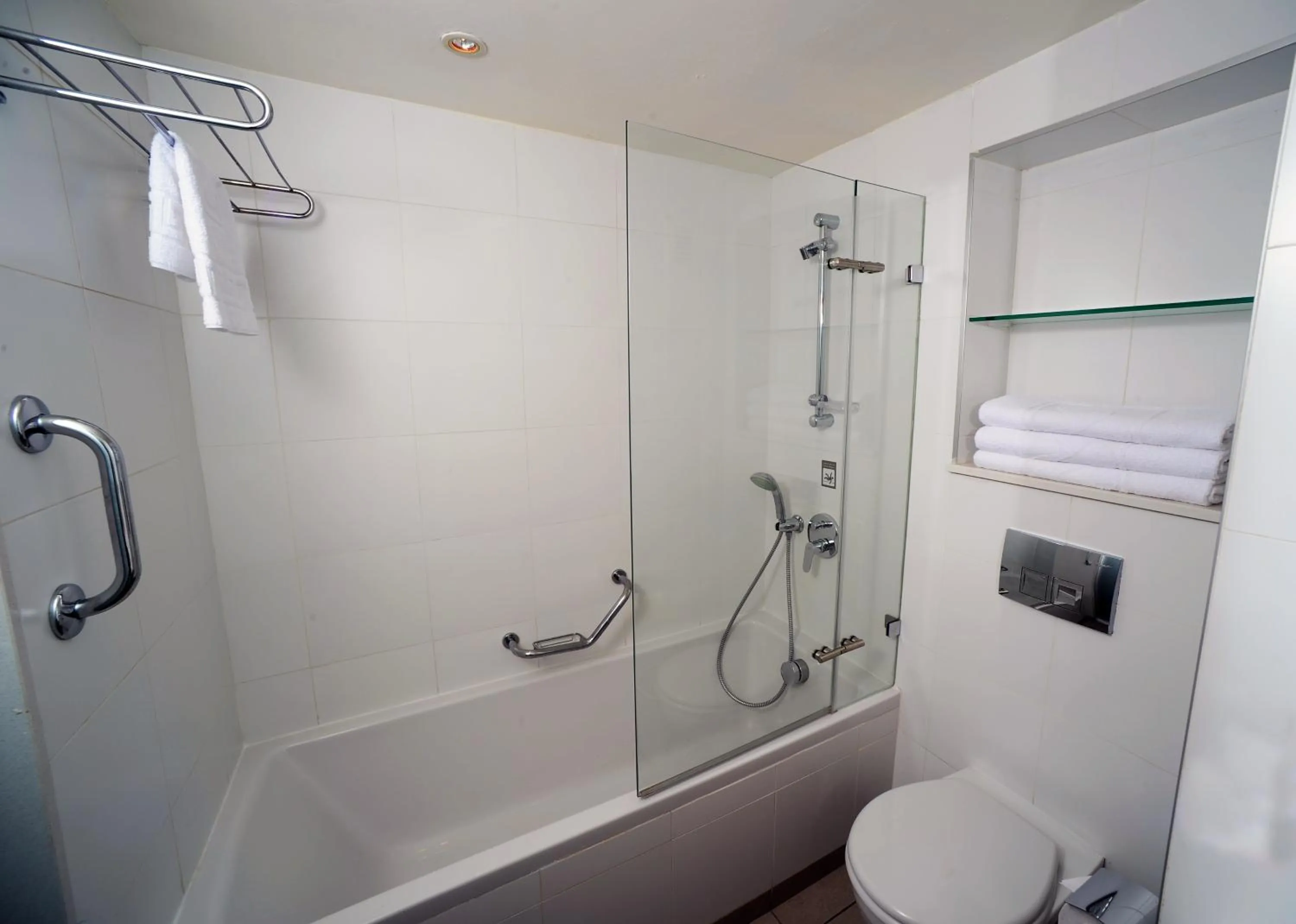 Bathroom in Sport Club by Isrotel Collection