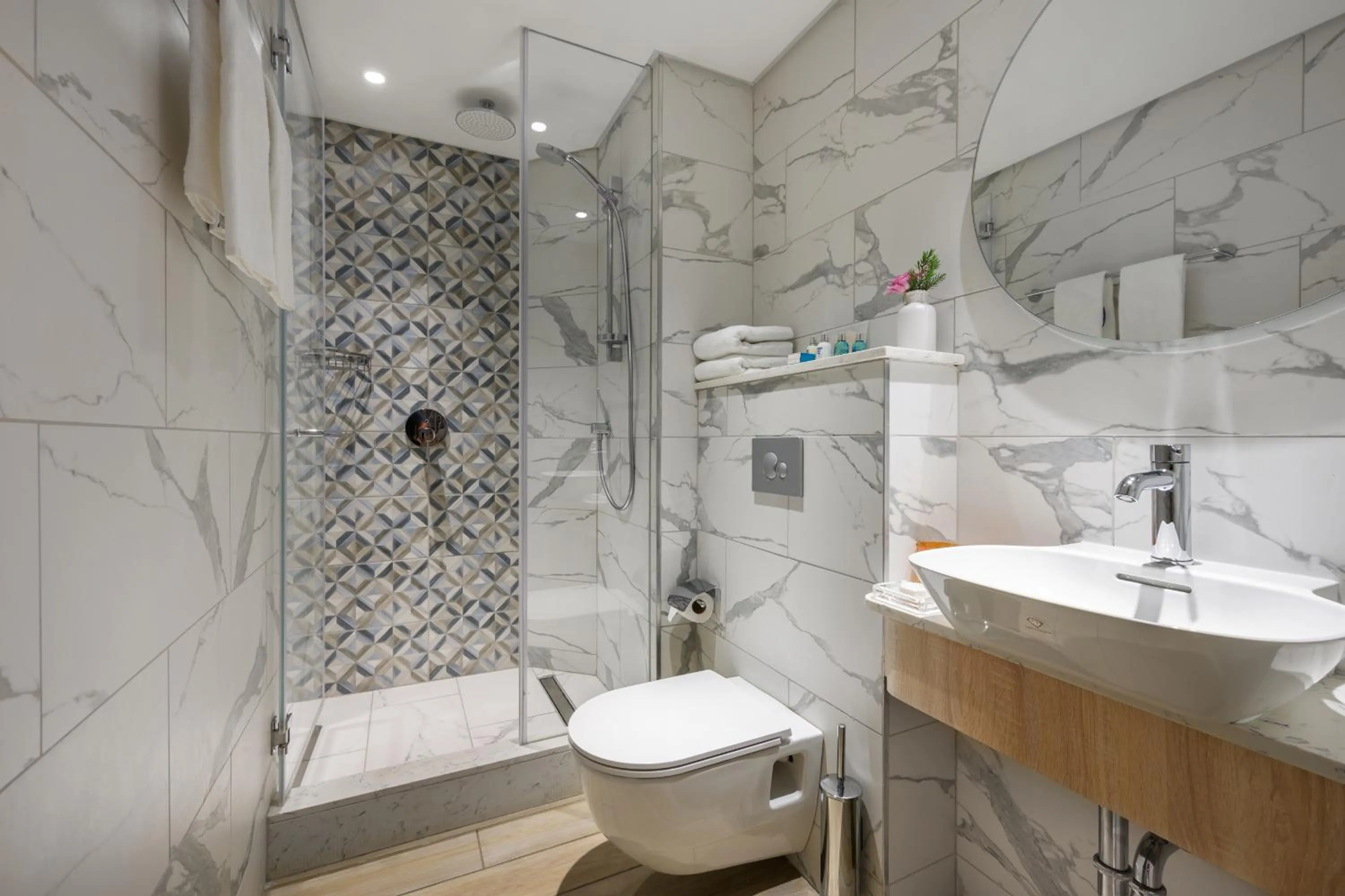 Bathroom in Royal Garden by Isrotel Collection