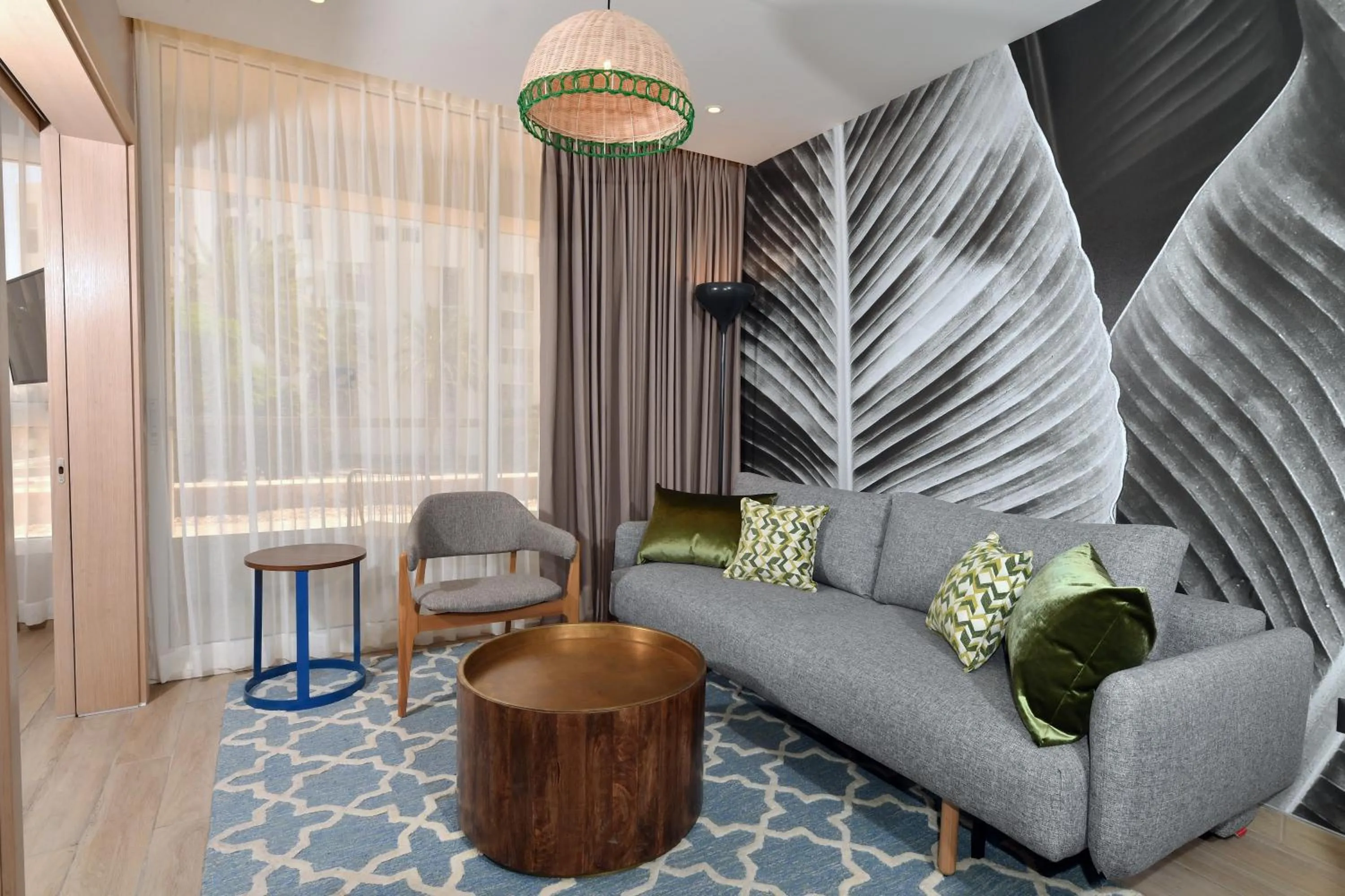 Living room in Royal Garden by Isrotel Collection