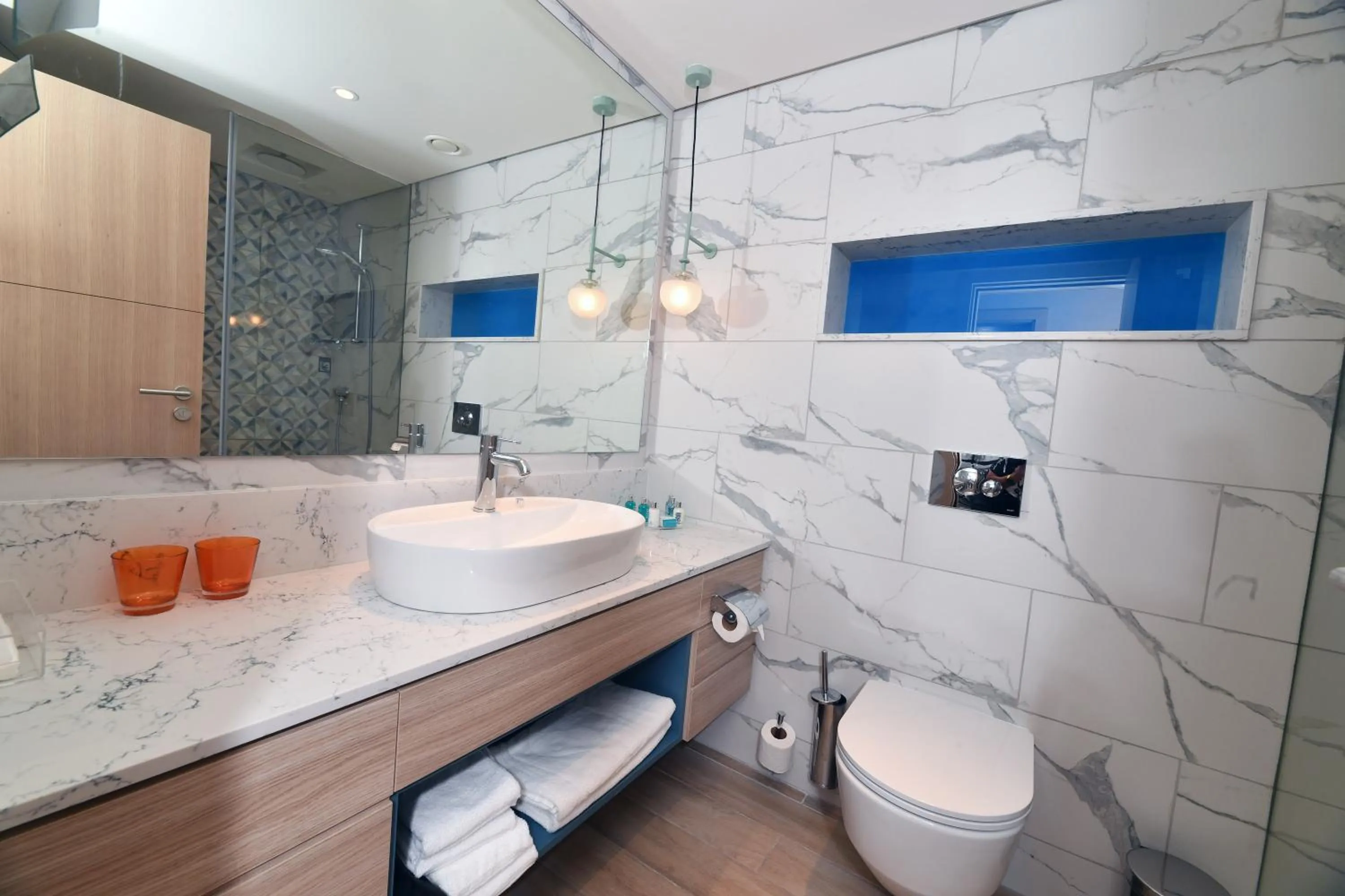 Bathroom in Royal Garden by Isrotel Collection