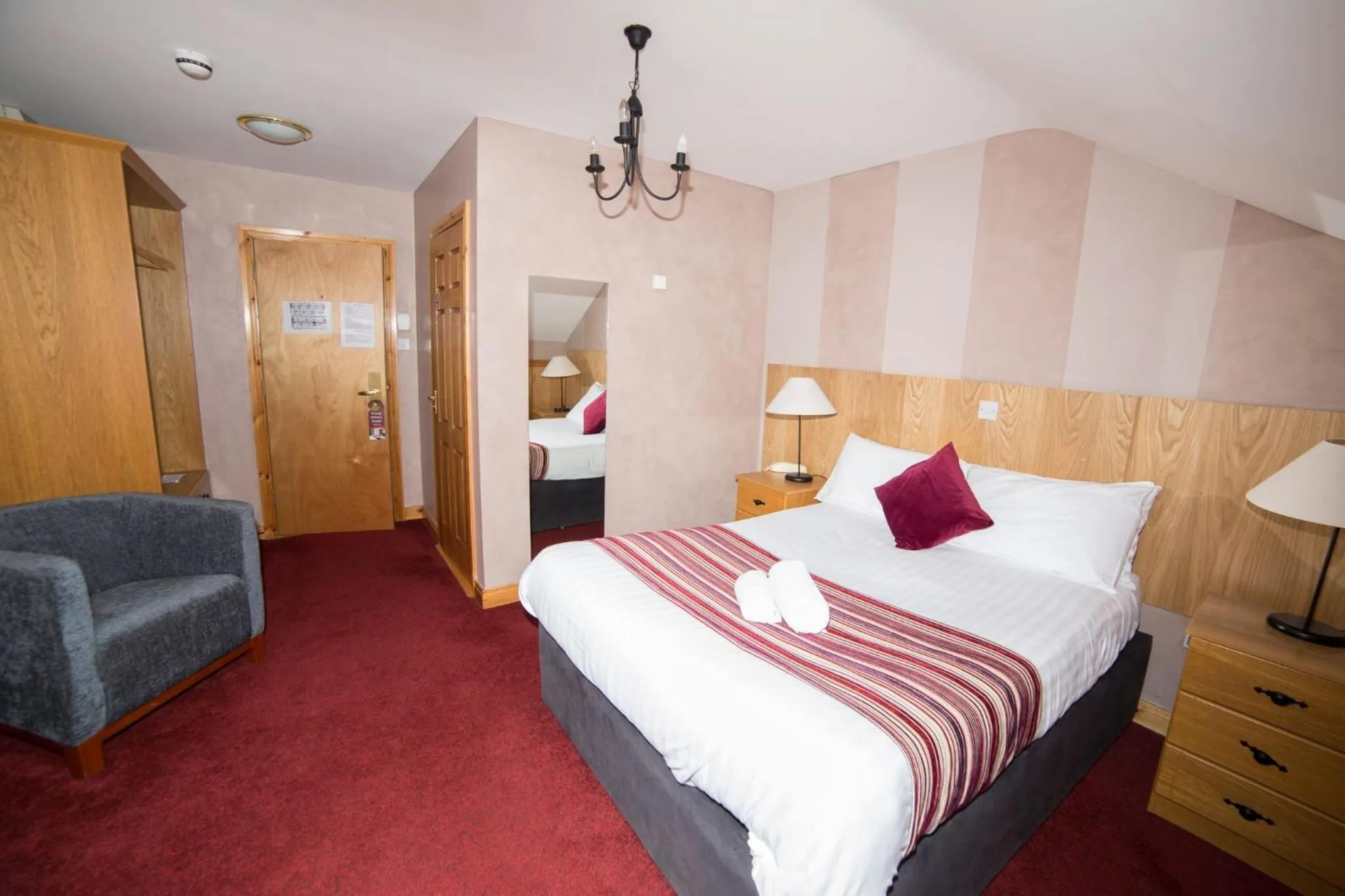 Photo of the whole room, Bed in The Frontier Hotel