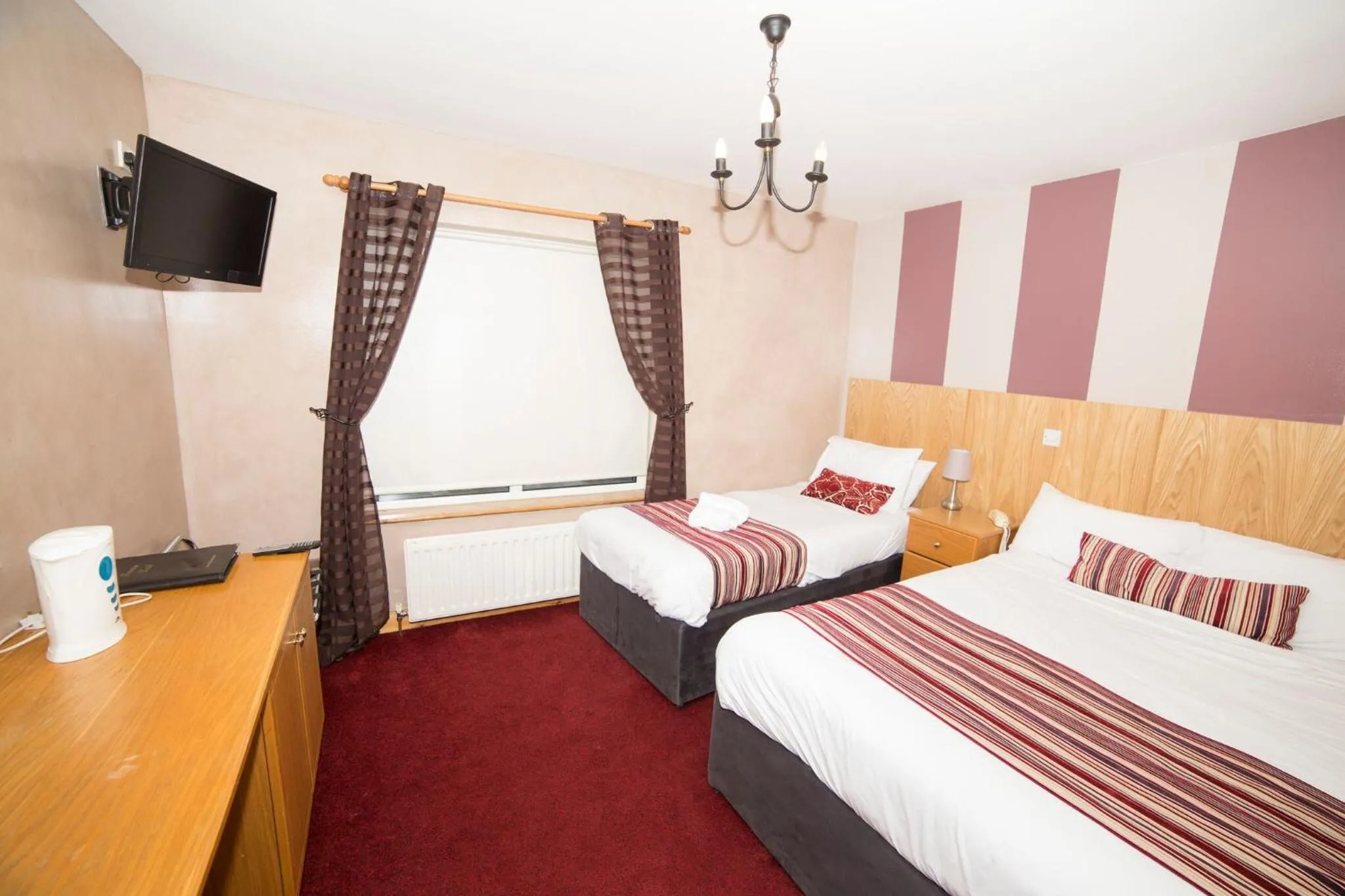 Bed in The Frontier Hotel