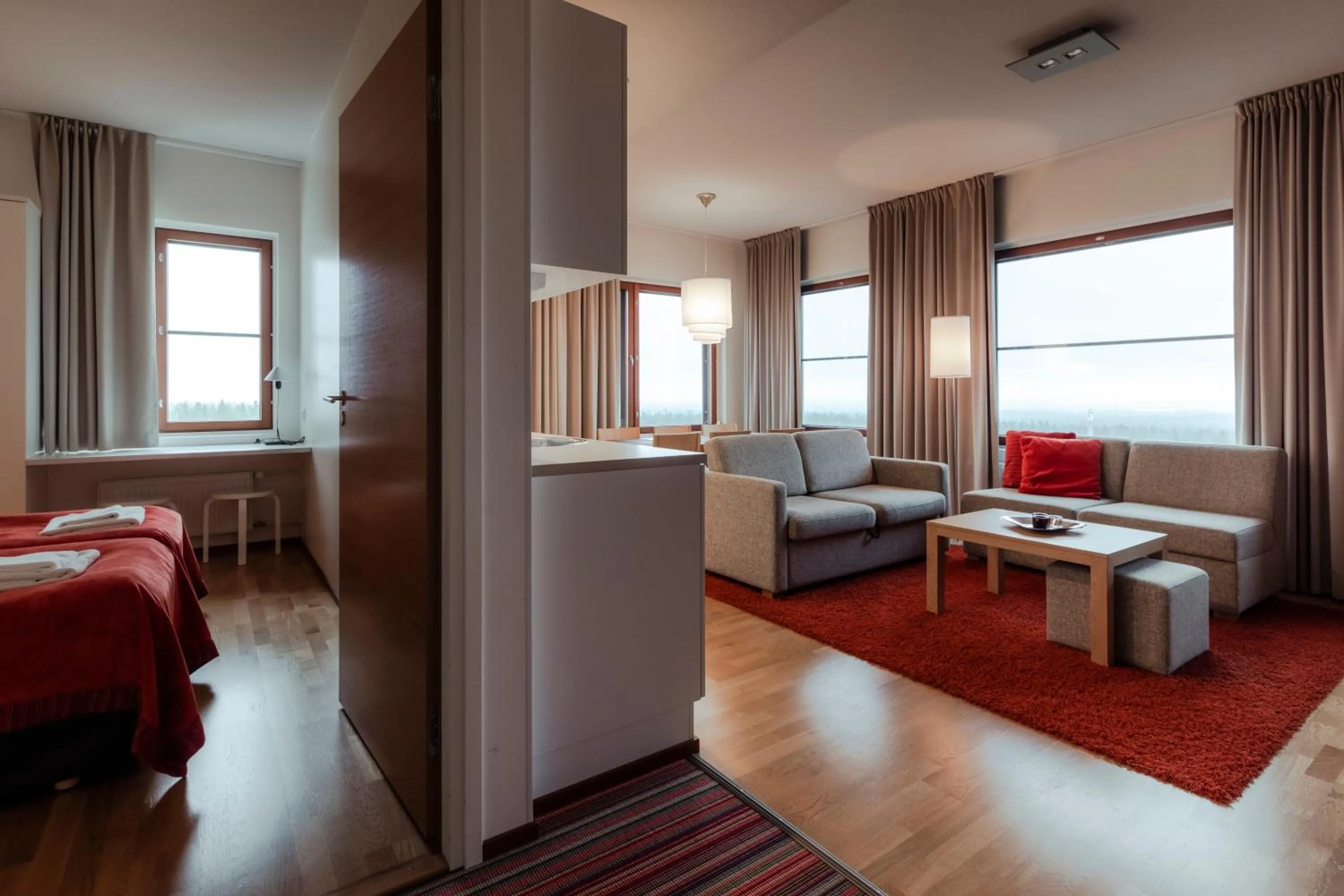 Living room, Bed in Lapland Hotels Saaga