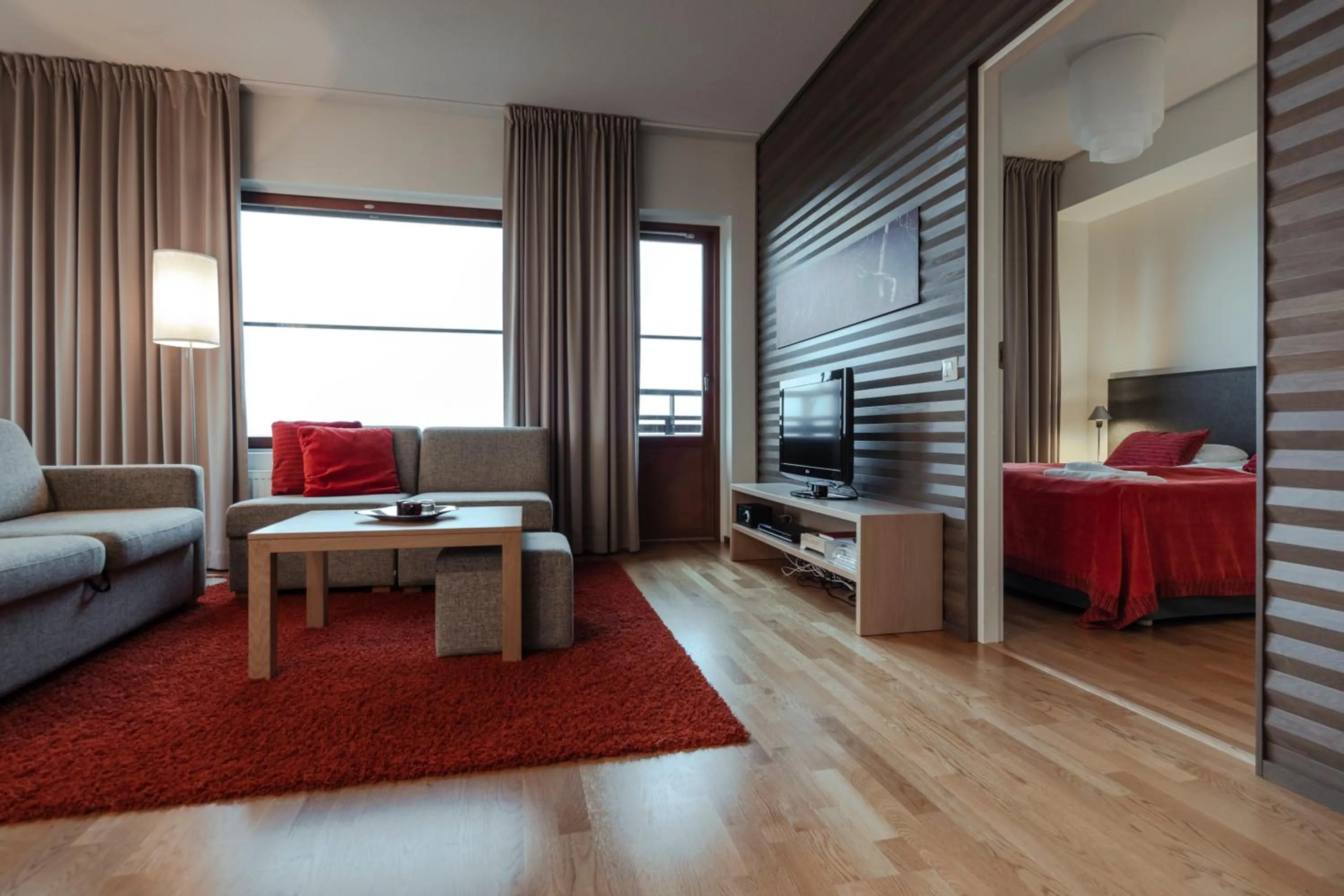 Living room, Bed in Lapland Hotels Saaga