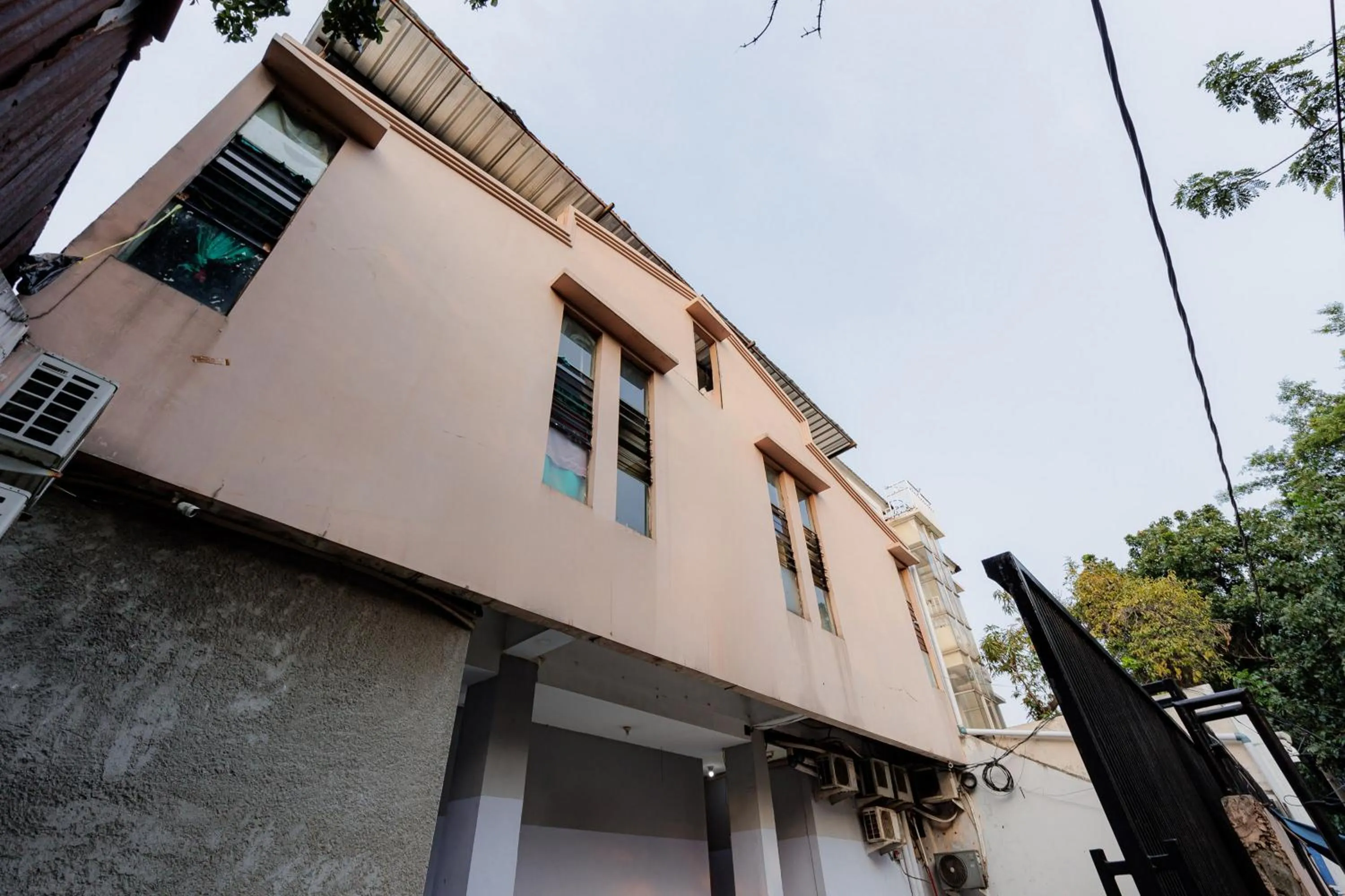 Facade/entrance in RedDoorz near Esa Unggul University Jakarta Campus