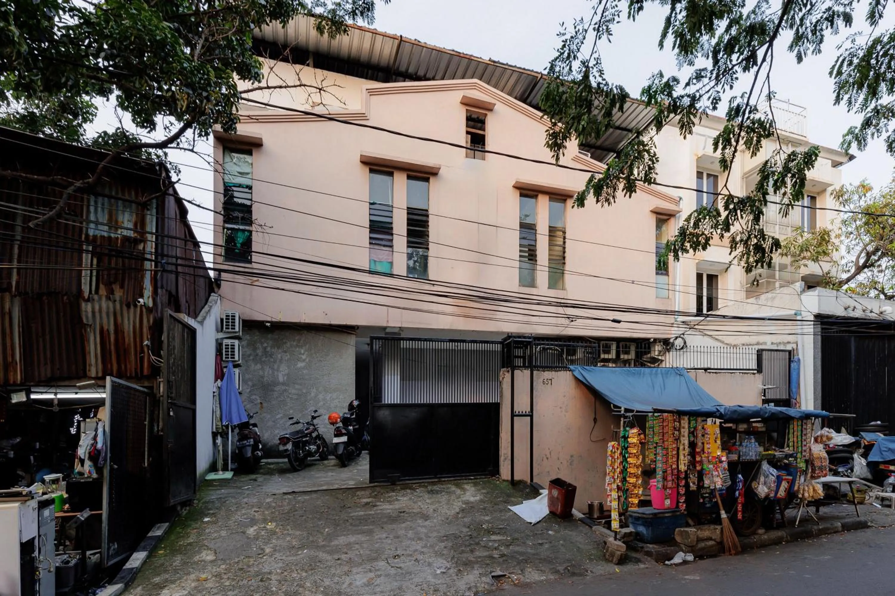 Facade/entrance in RedDoorz near Esa Unggul University Jakarta Campus