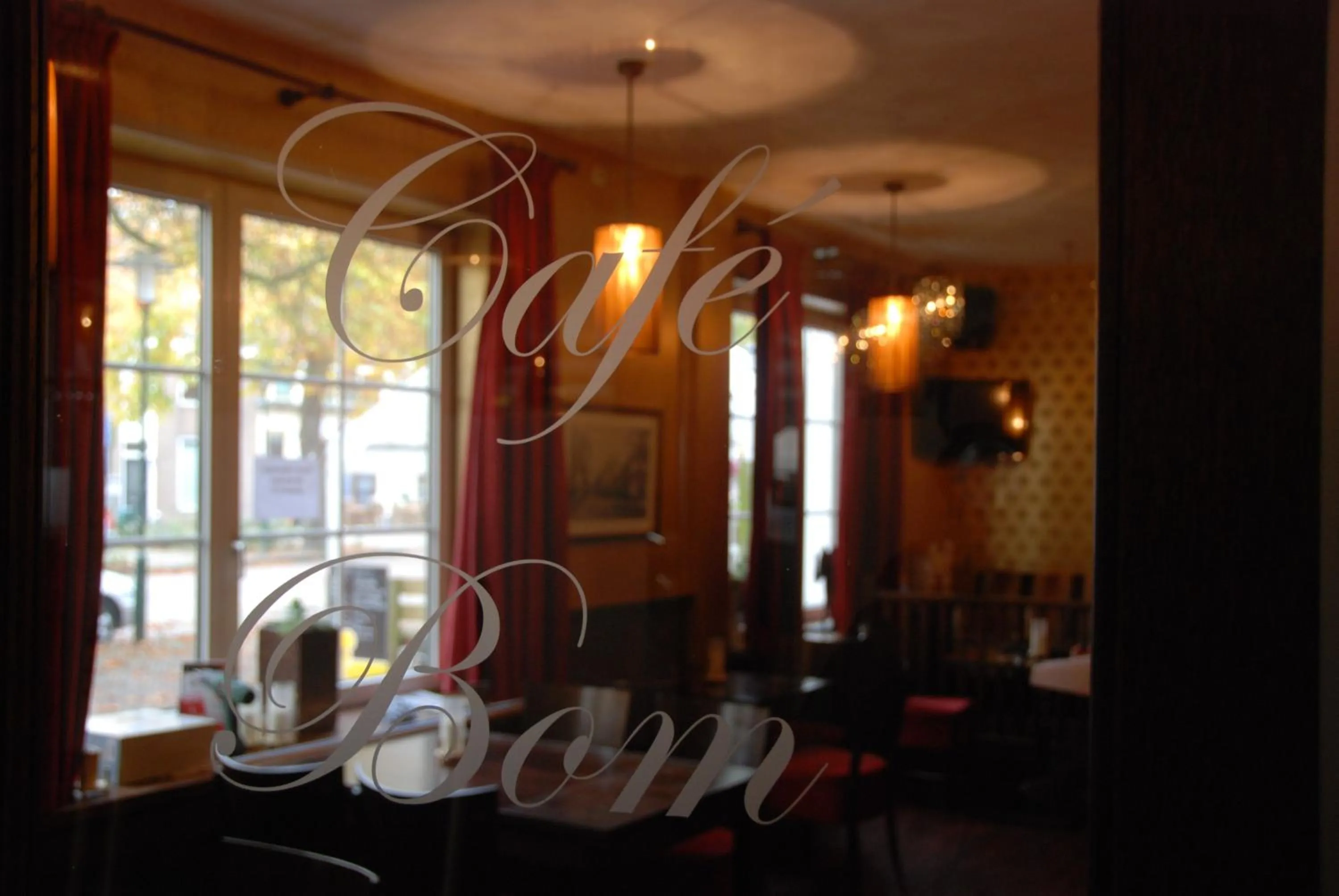 Property logo or sign in Hotel Bom