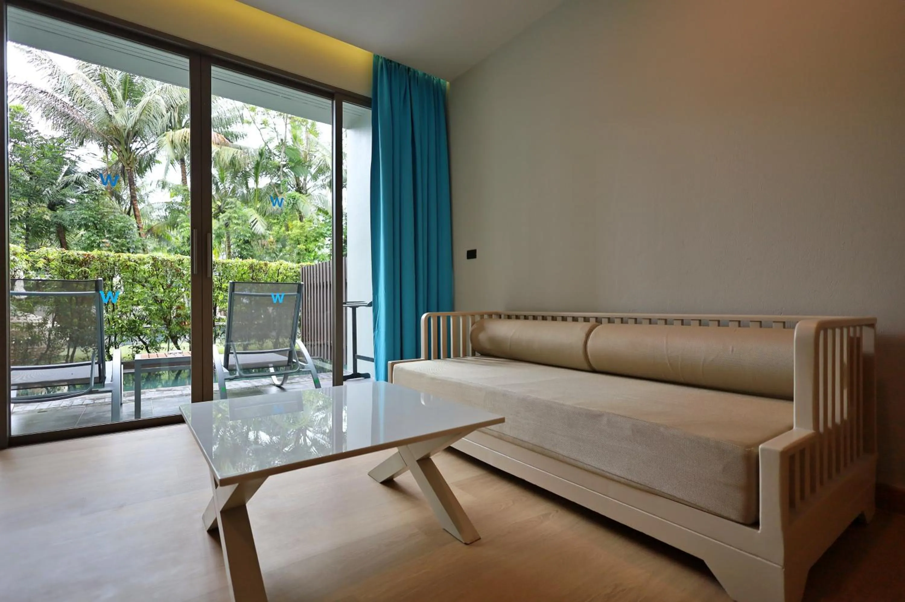 Living room in The Waters Khao Lak by Katathani - SHA Extra Plus