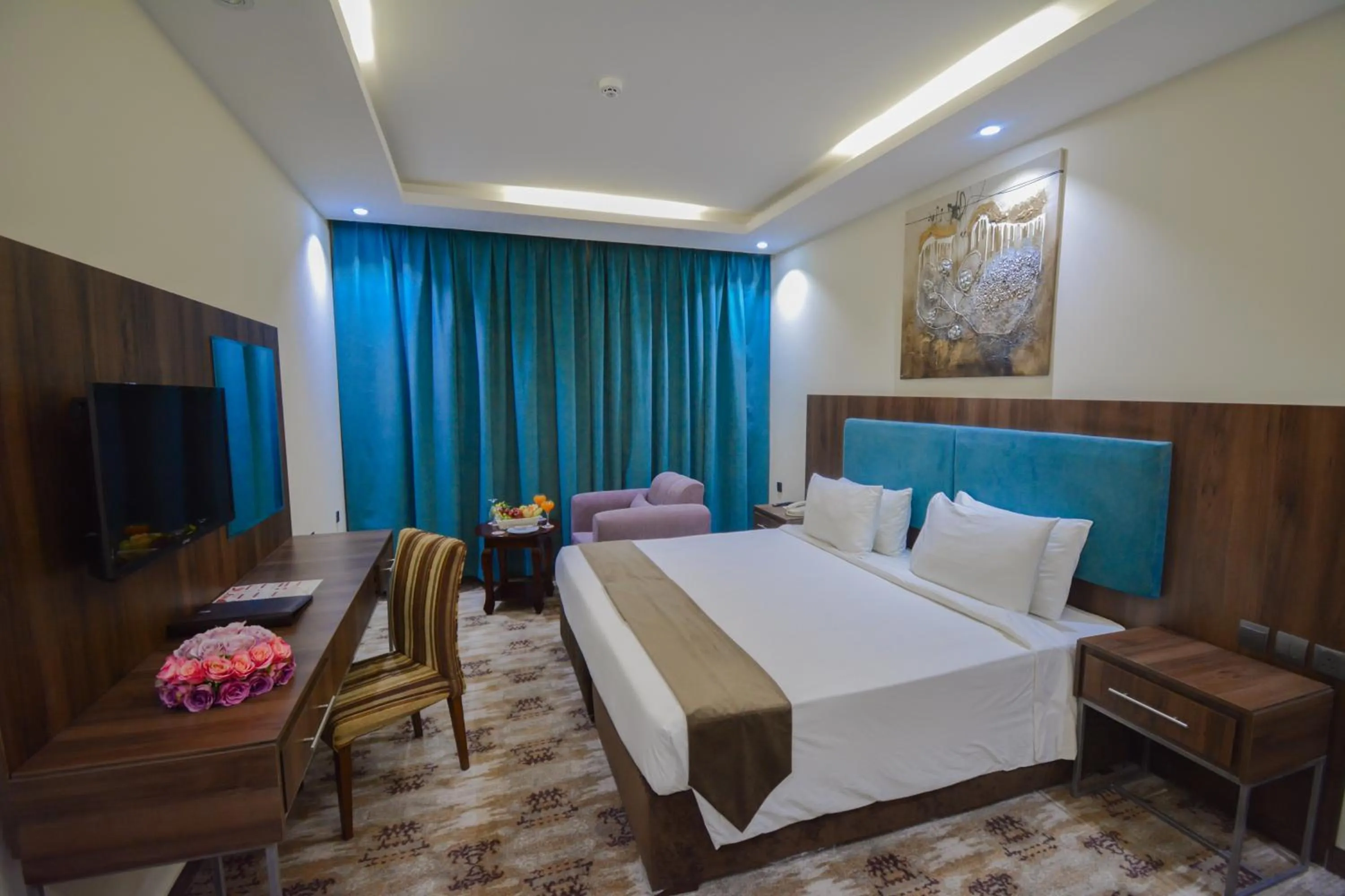 Bedroom in Reef Global Hotel