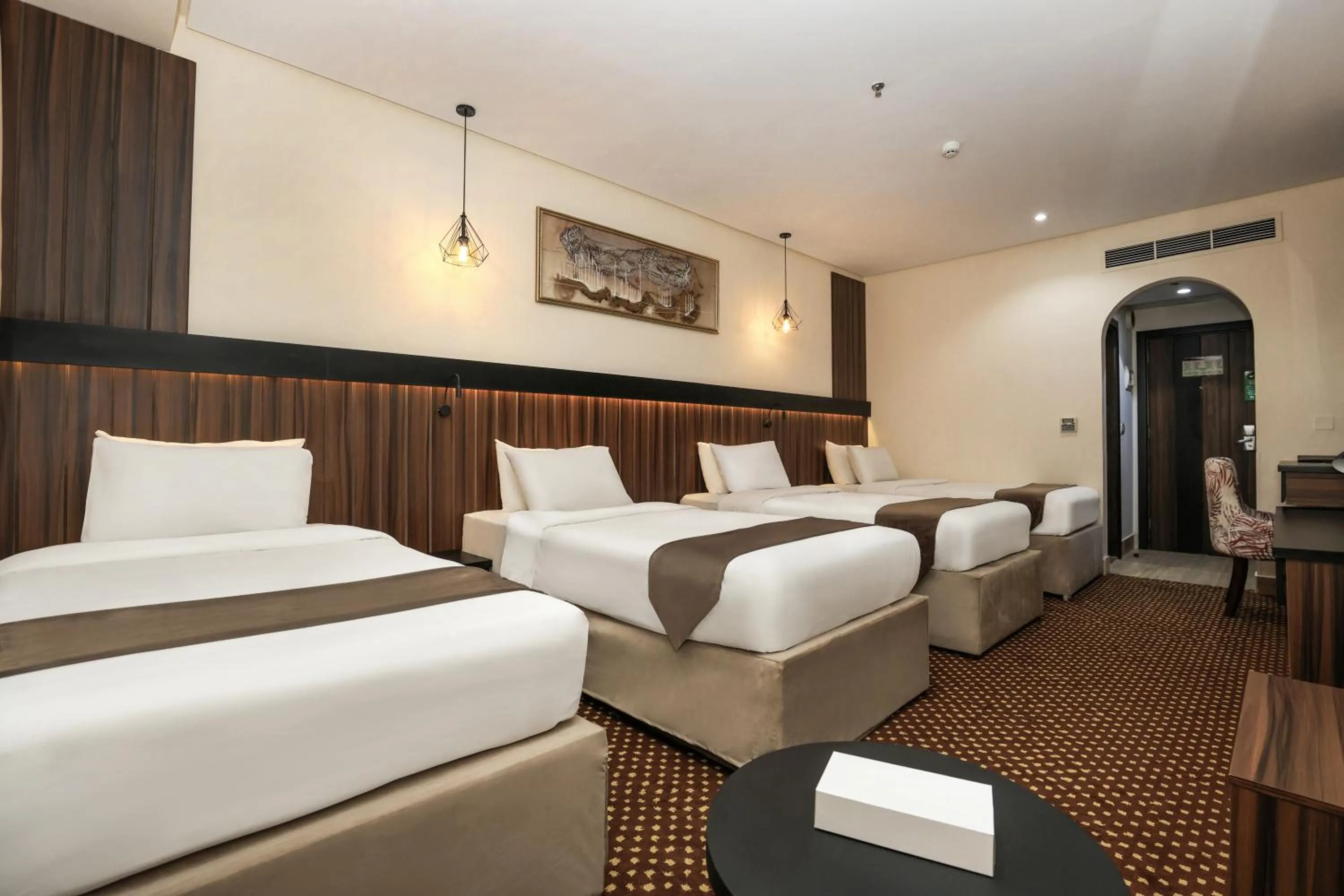 Bed in Reef Global Hotel