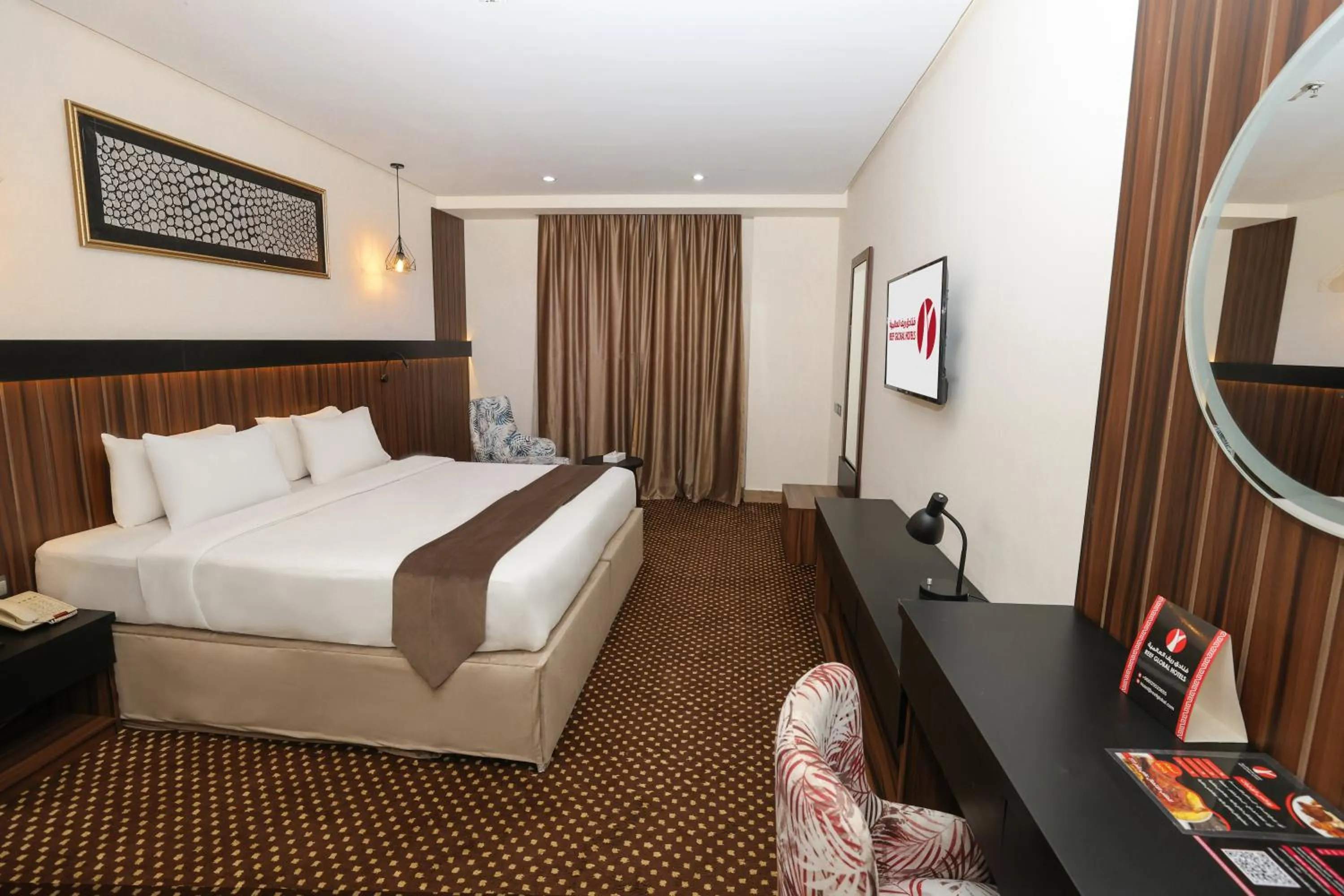 Bed in Reef Global Hotel